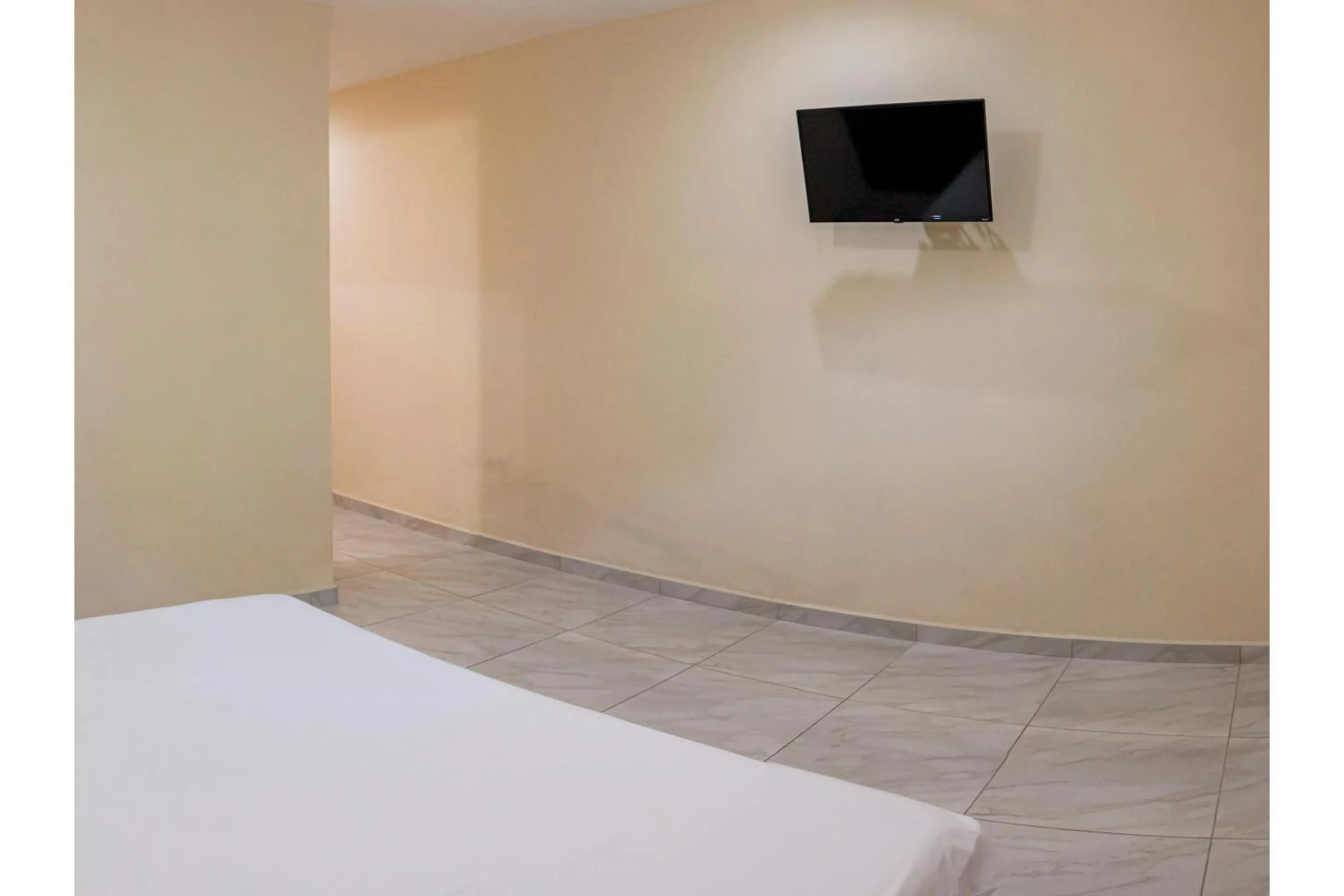 Bedroom, Bed in OYO Hotel La Playa