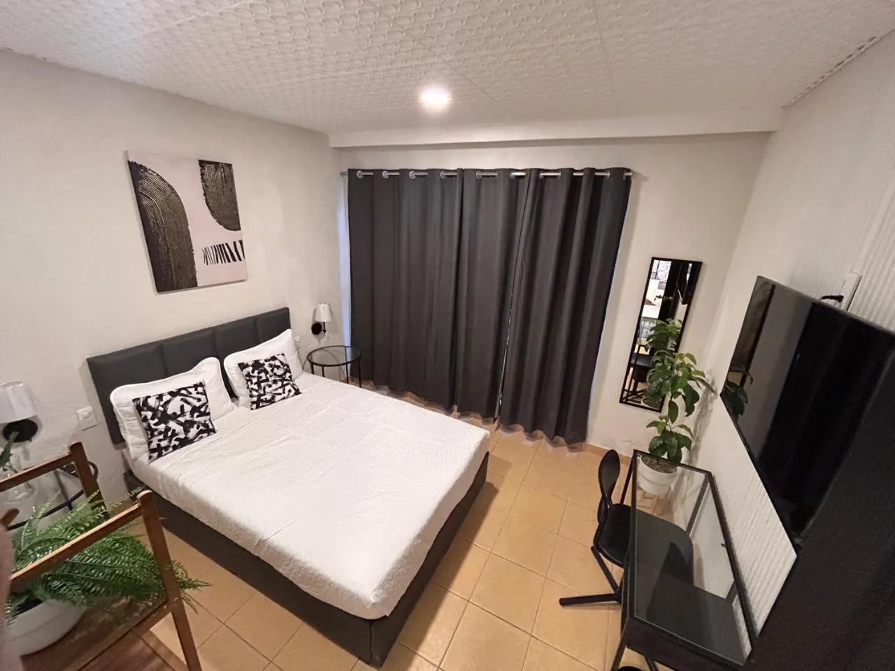 Photo of the whole room, Bed in Singular Reforma