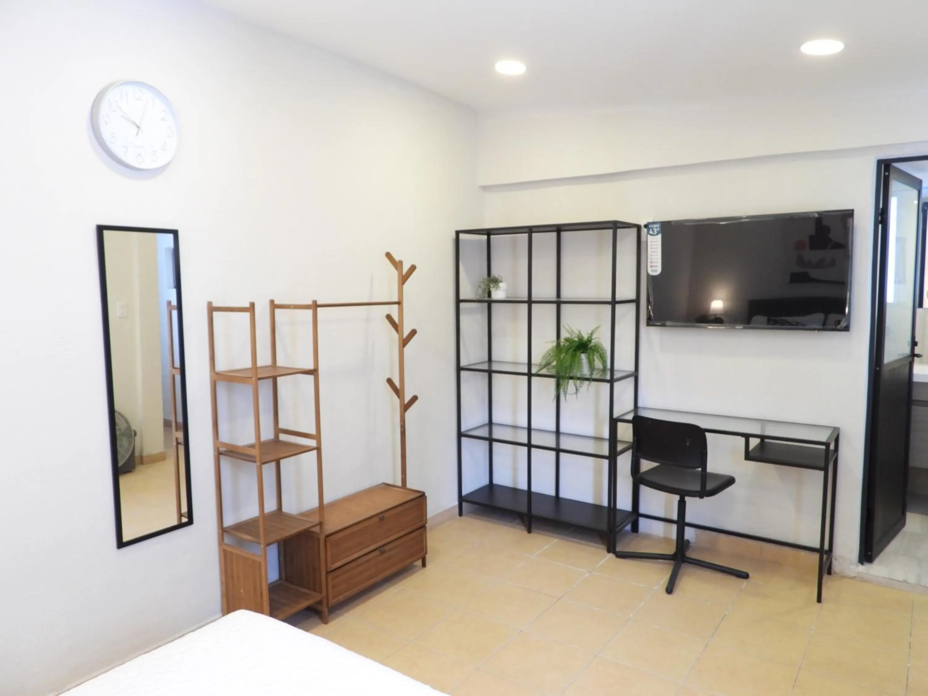 Photo of the whole room, Bed in Singular Reforma