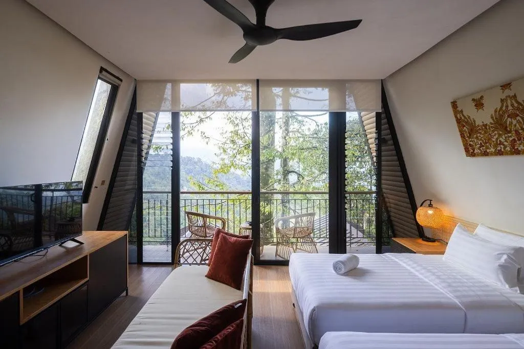 Bed in Vanavasa Resort