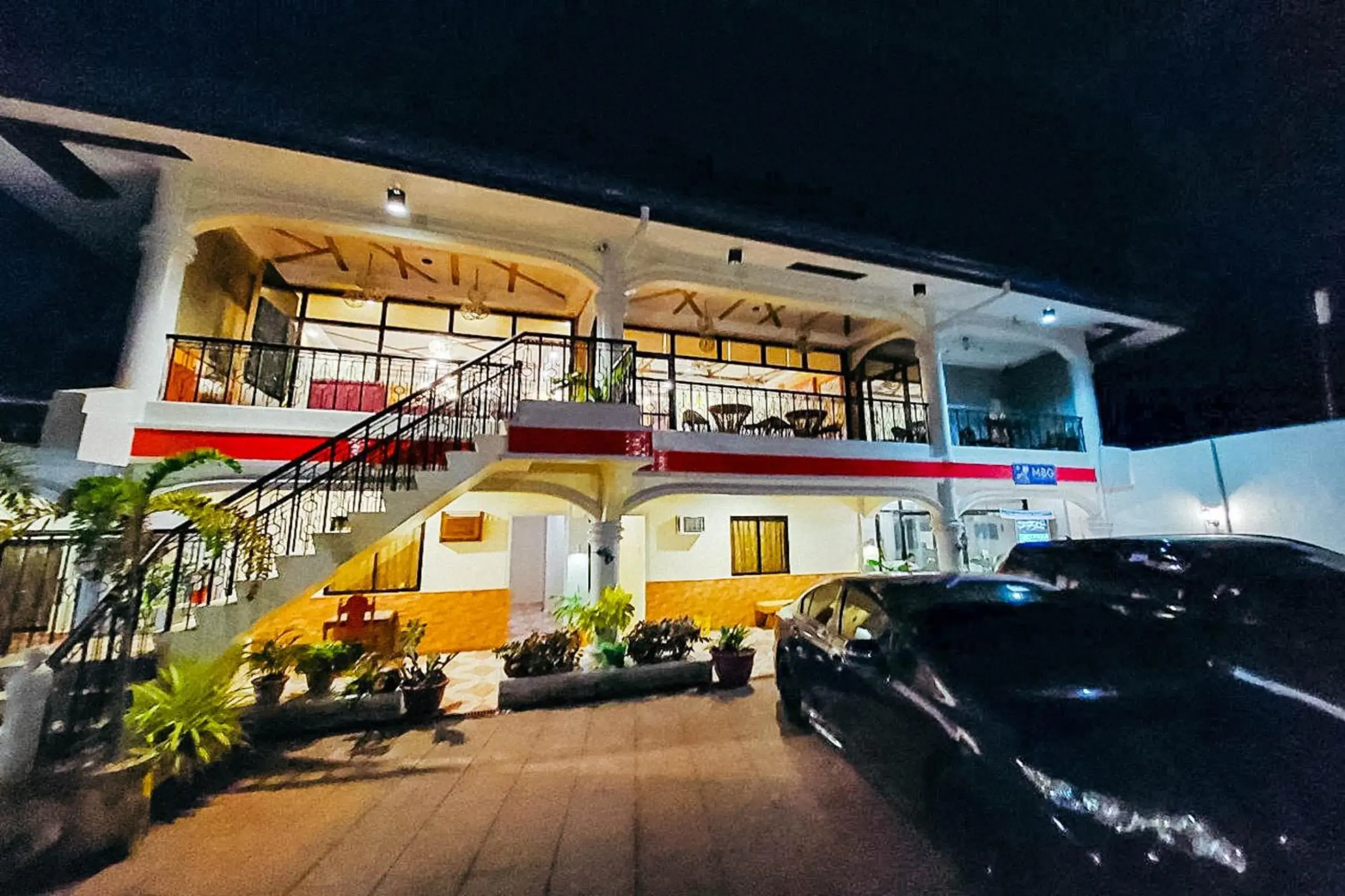 Property building in MBG Travellers Inn powered by Cocotel Property building in MBG Travellers Inn powered by Cocotel