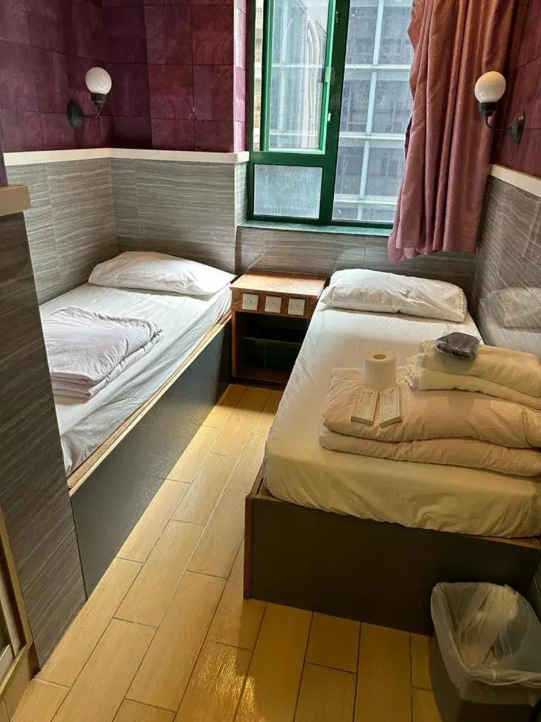 Bed in Just Inn on Nathan Road Bed in Just Inn on Nathan Road
