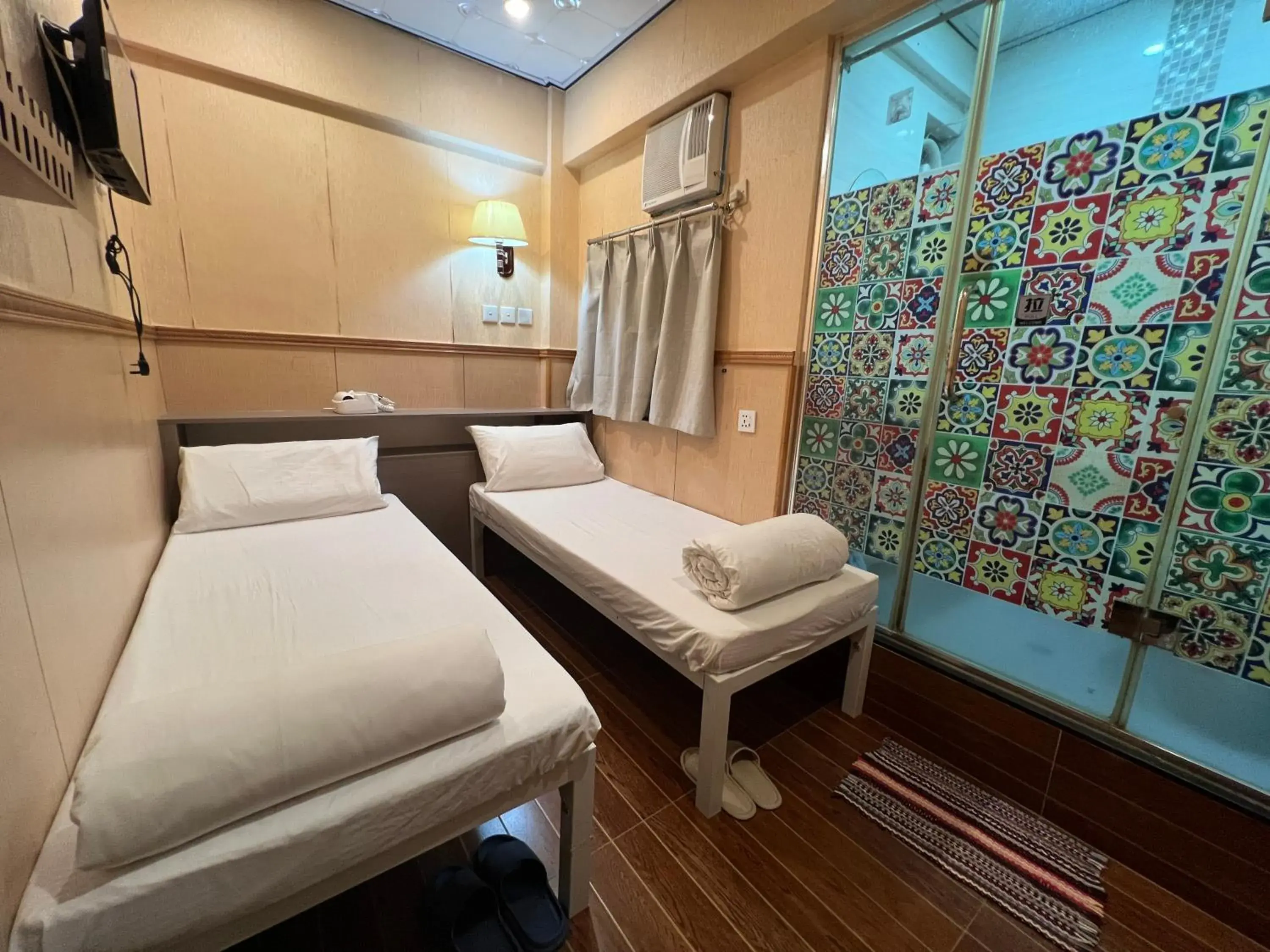 Bed in Just Inn on Nathan Road Bed in Just Inn on Nathan Road