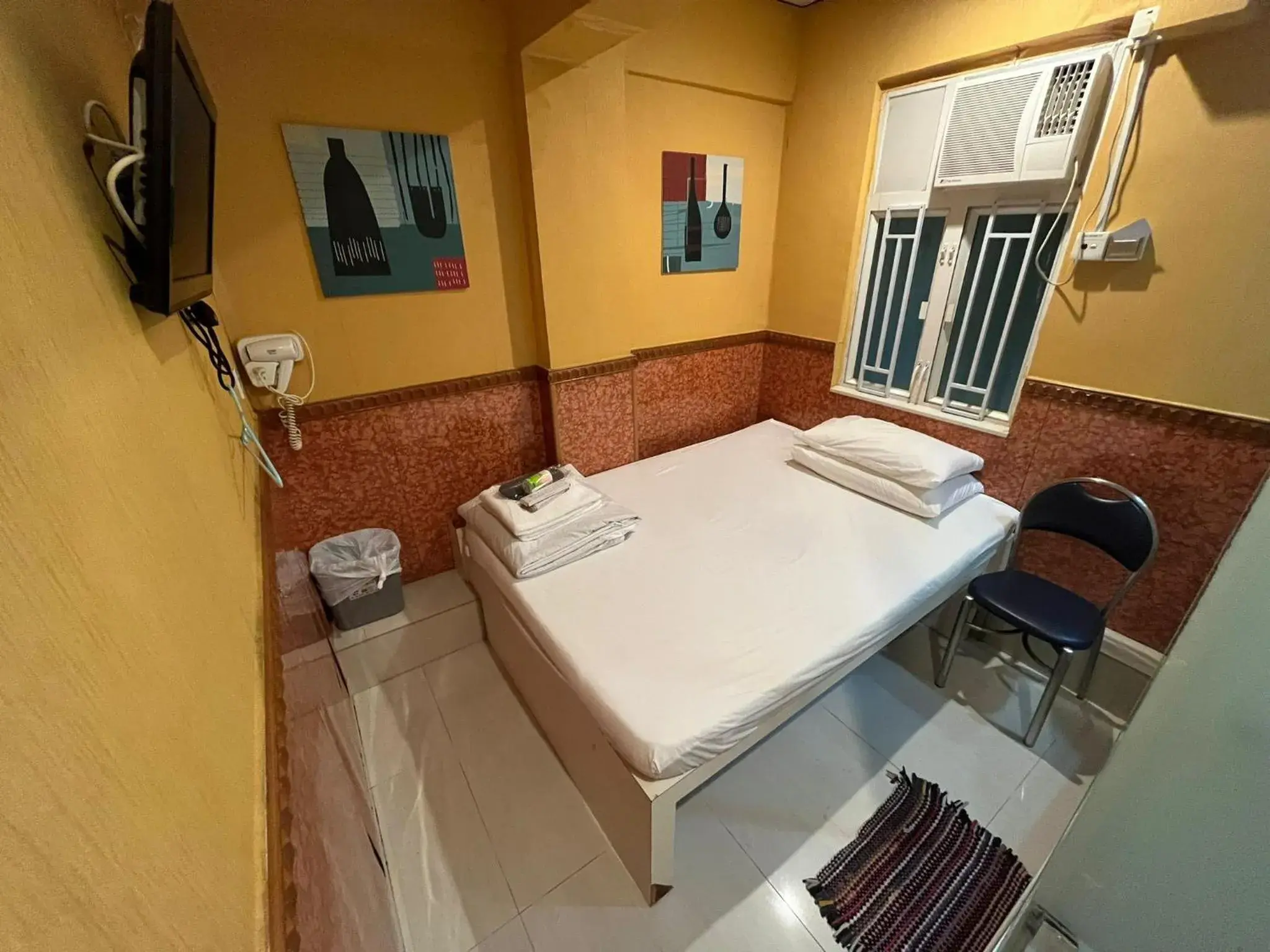 Bed in Just Inn on Nathan Road Bed in Just Inn on Nathan Road