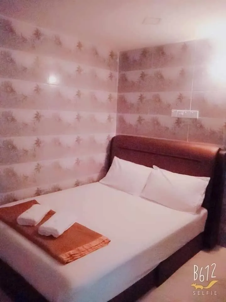 Bed in ARK Malacca Hotel