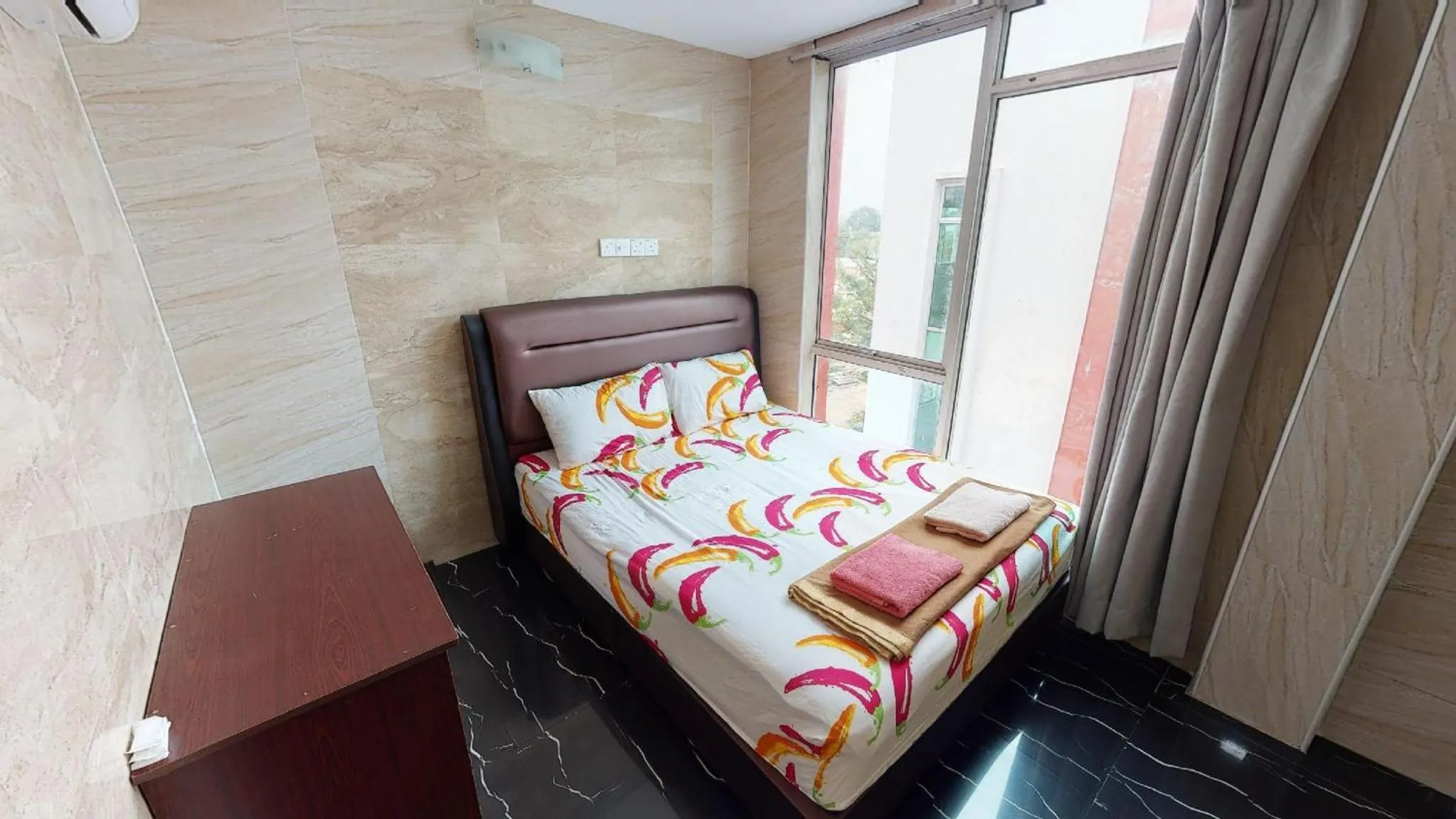 Bed in ARK Malacca Hotel