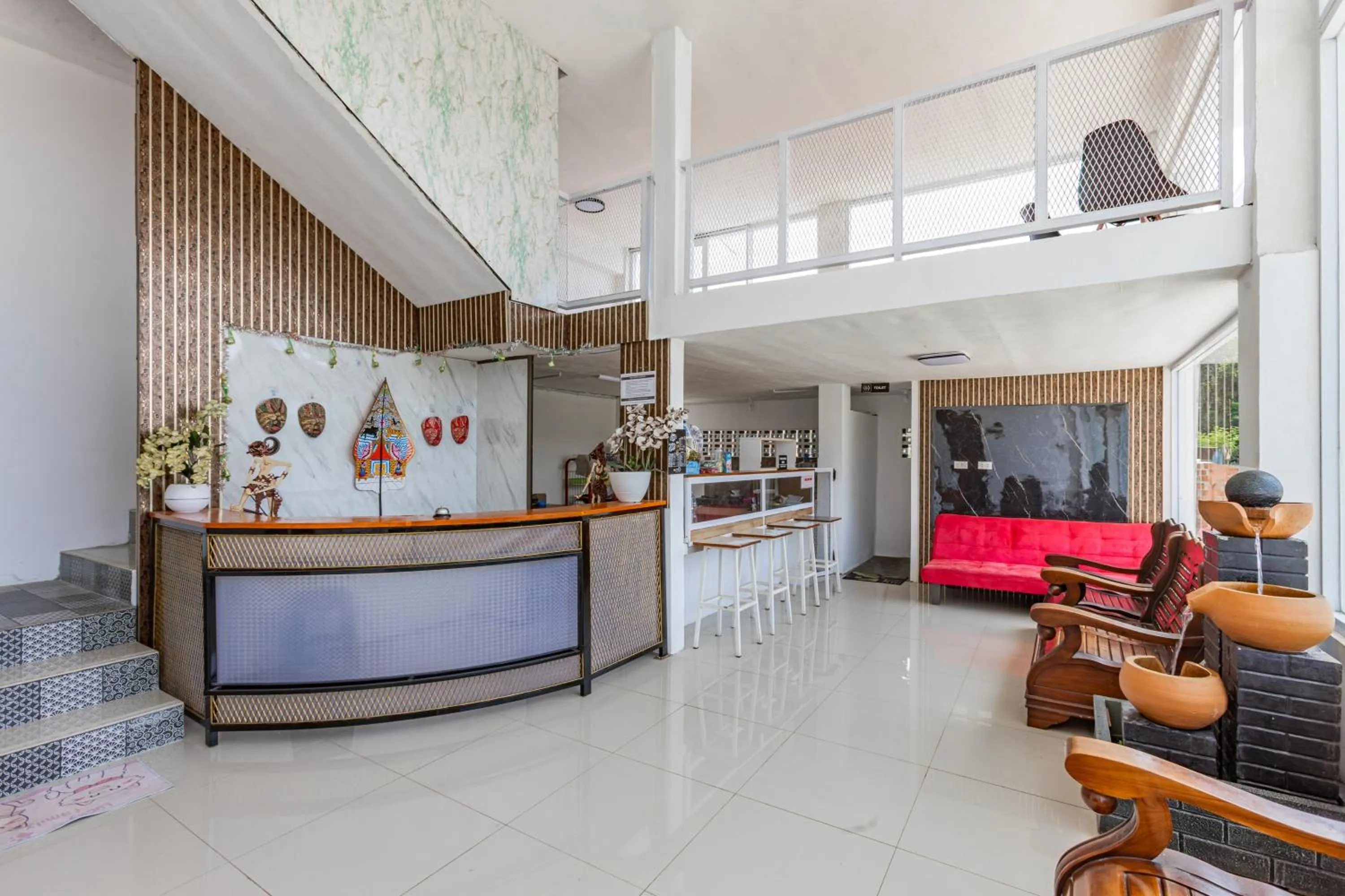 Lobby or reception in Hotel O Guest House Maria