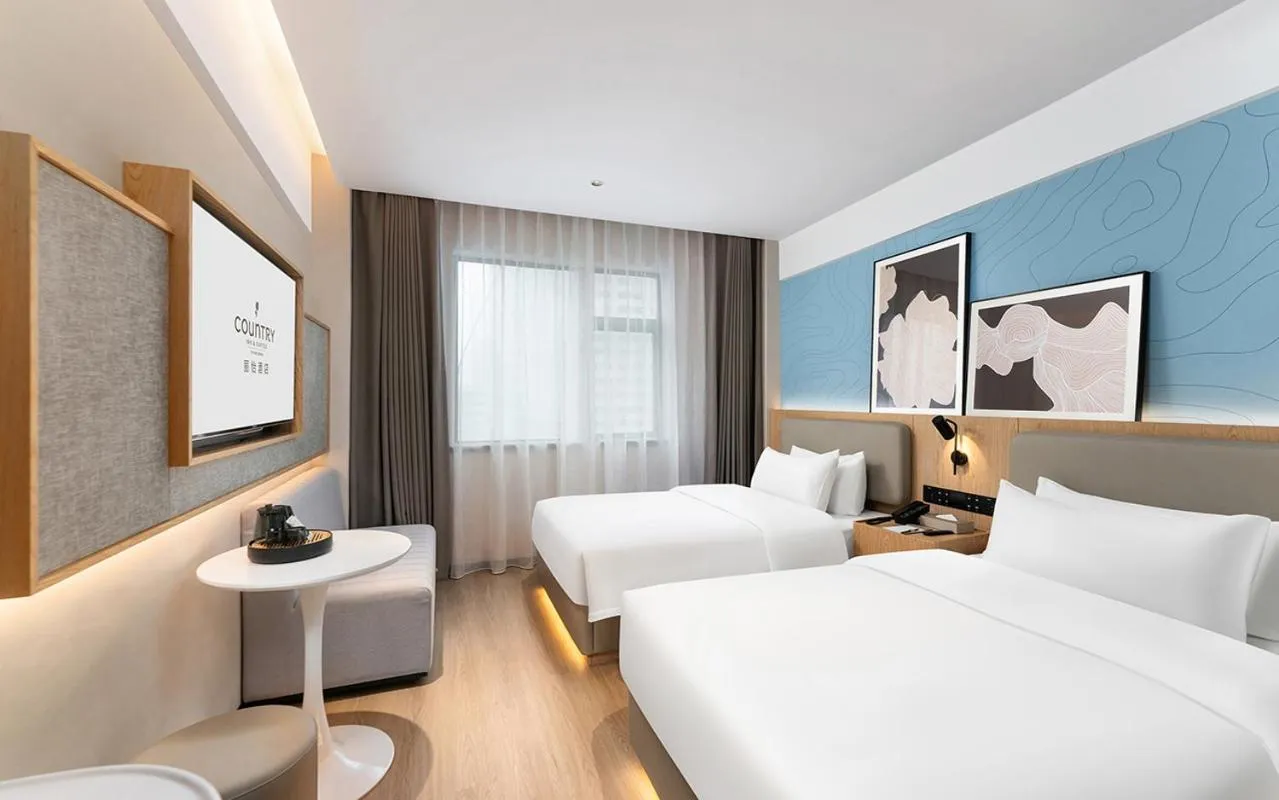 Bed in Country Inn & Suite by Radisson, Nanchang Tengwangge Wanshou Palace Subway Station