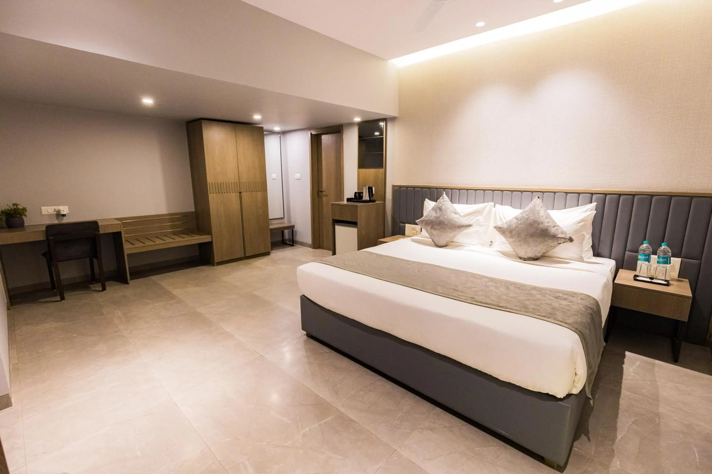 Bed in The Augusta Club & Resort