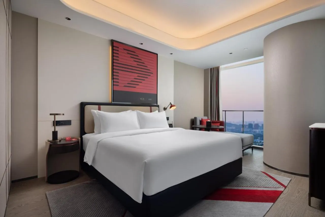 Photo of the whole room, Bed in Radisson Red Guangzhou South Railway Station