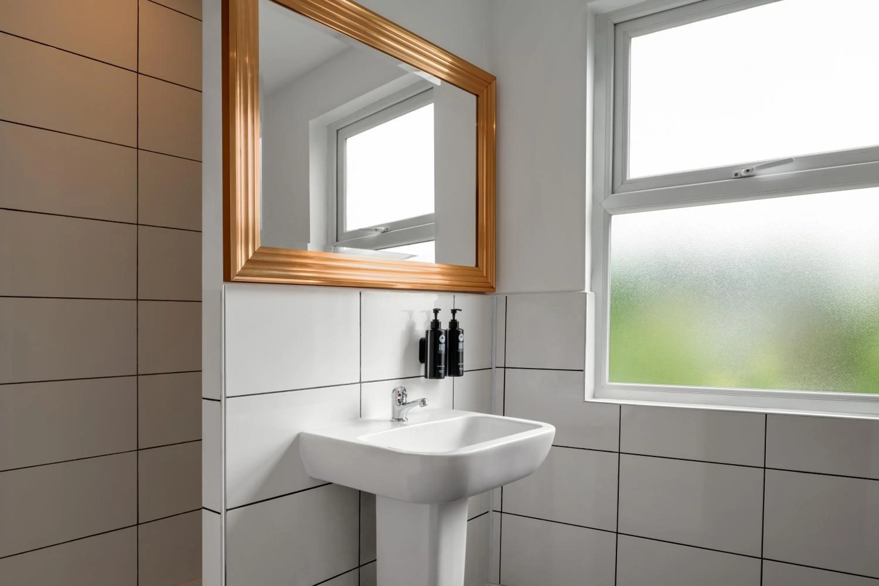 Bathroom in Trafford Hall Hotel Manchester, Trademark Collection by Wyndham