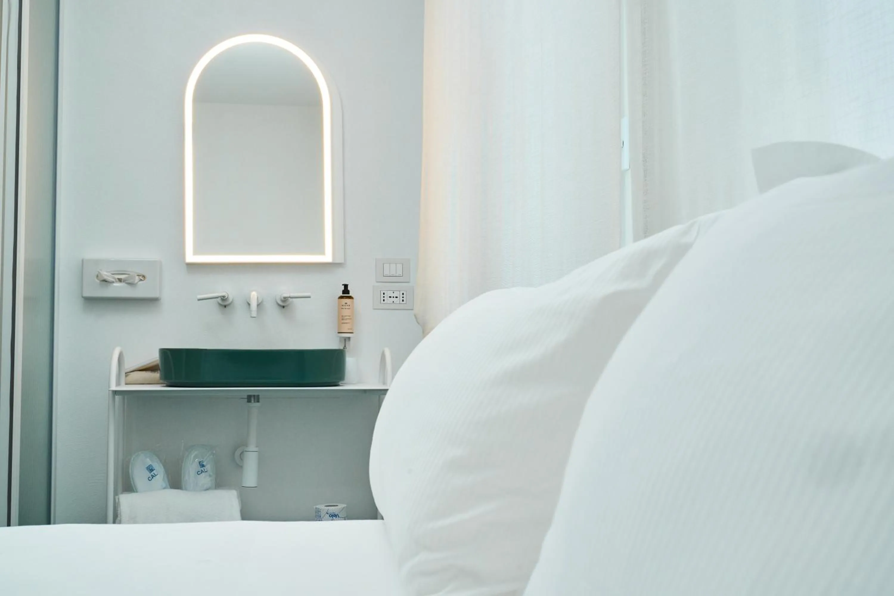 Bed in CALEA Boutique Hotel