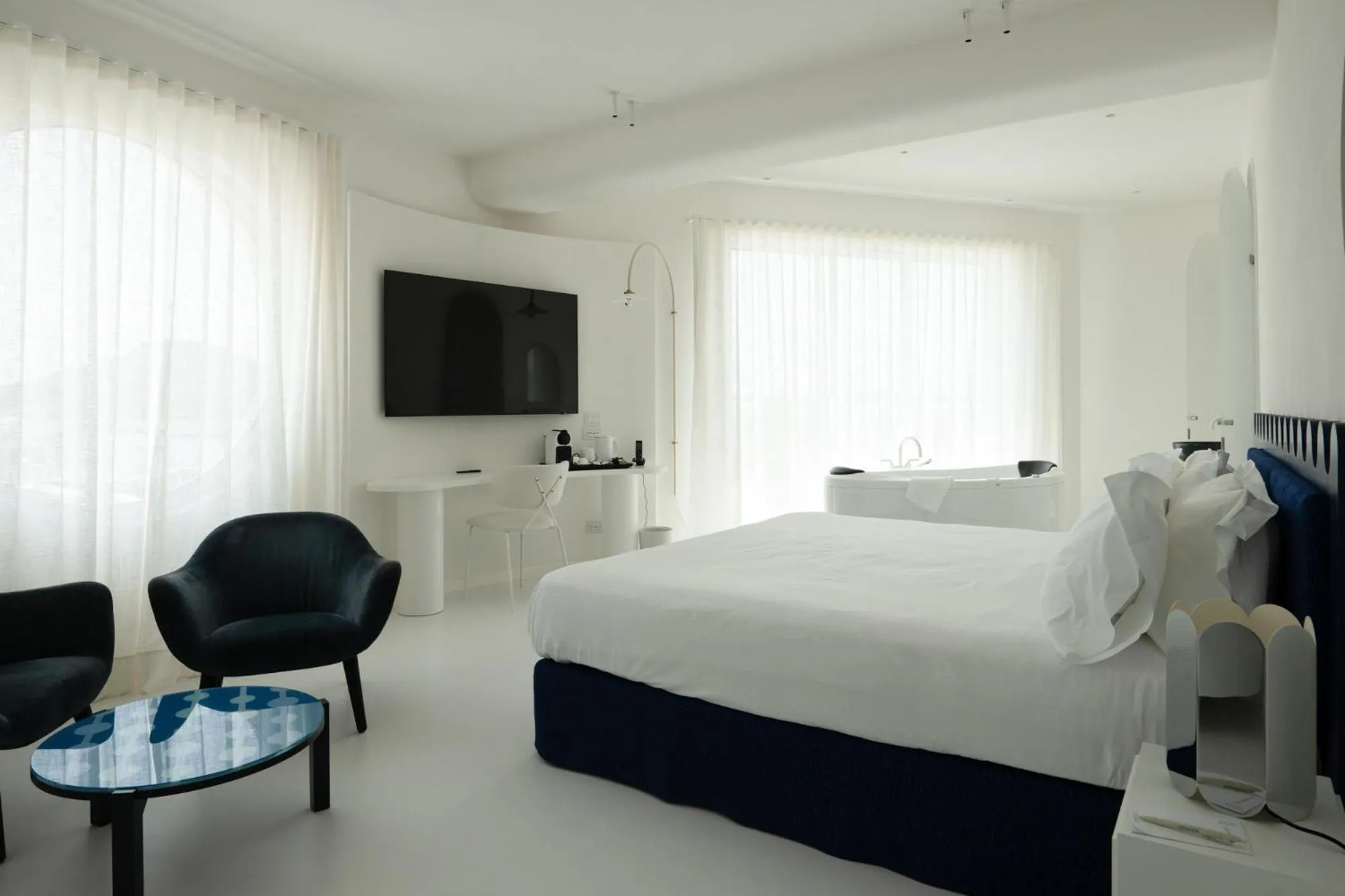 Bed in CALEA Boutique Hotel