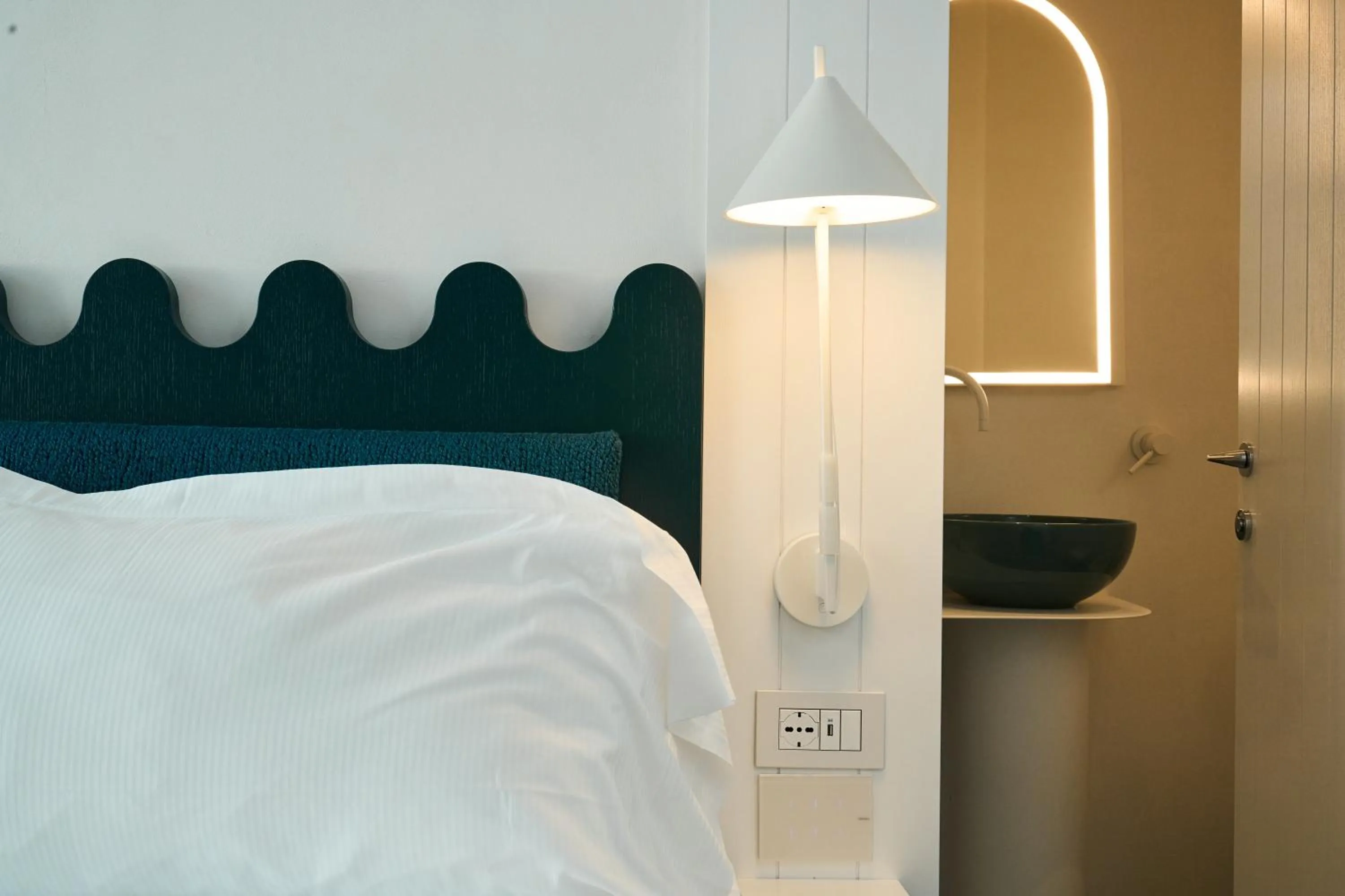 Bed in CALEA Boutique Hotel