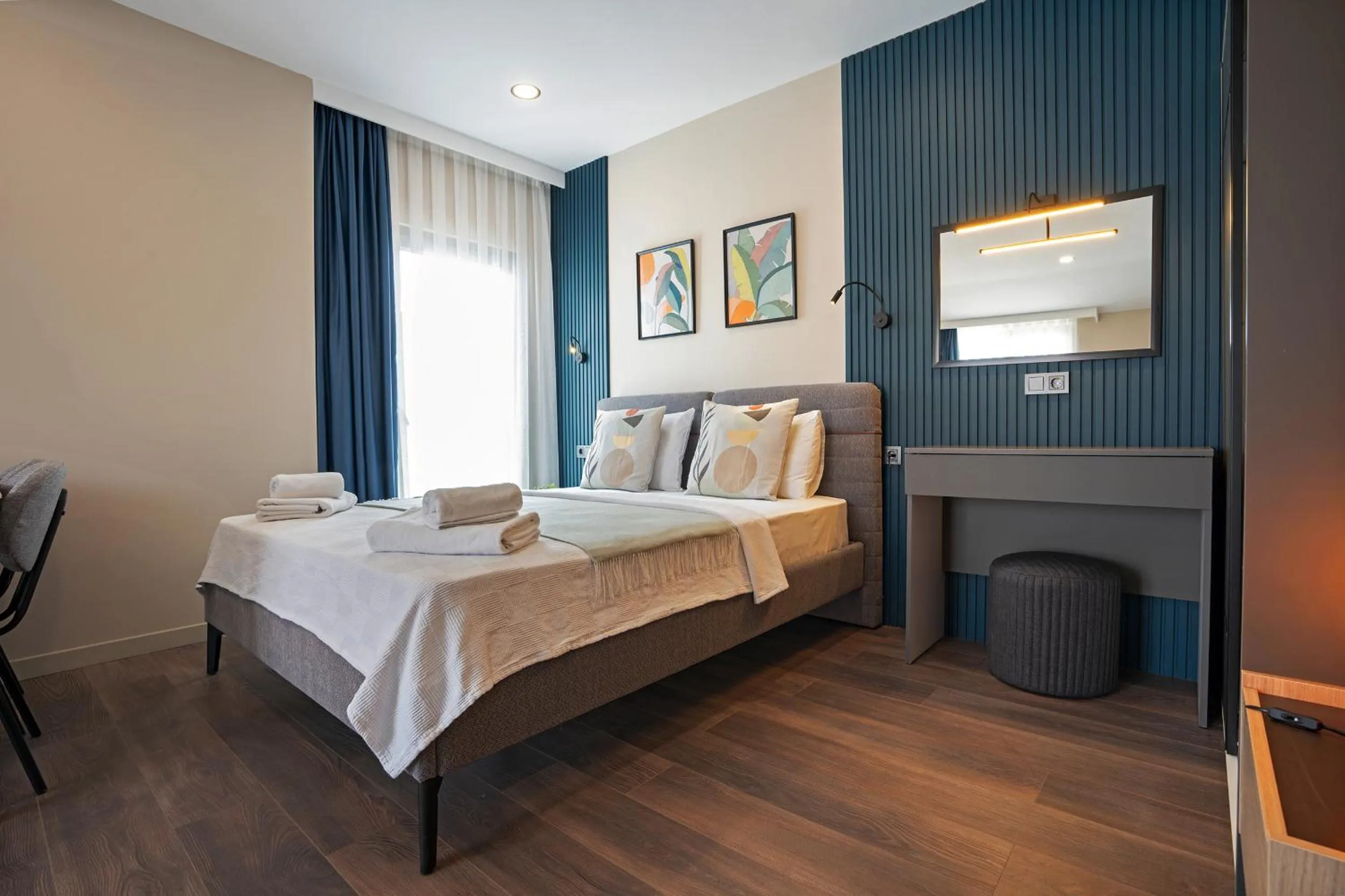 Photo of the whole room, Bed in Doqu Suites Hotel