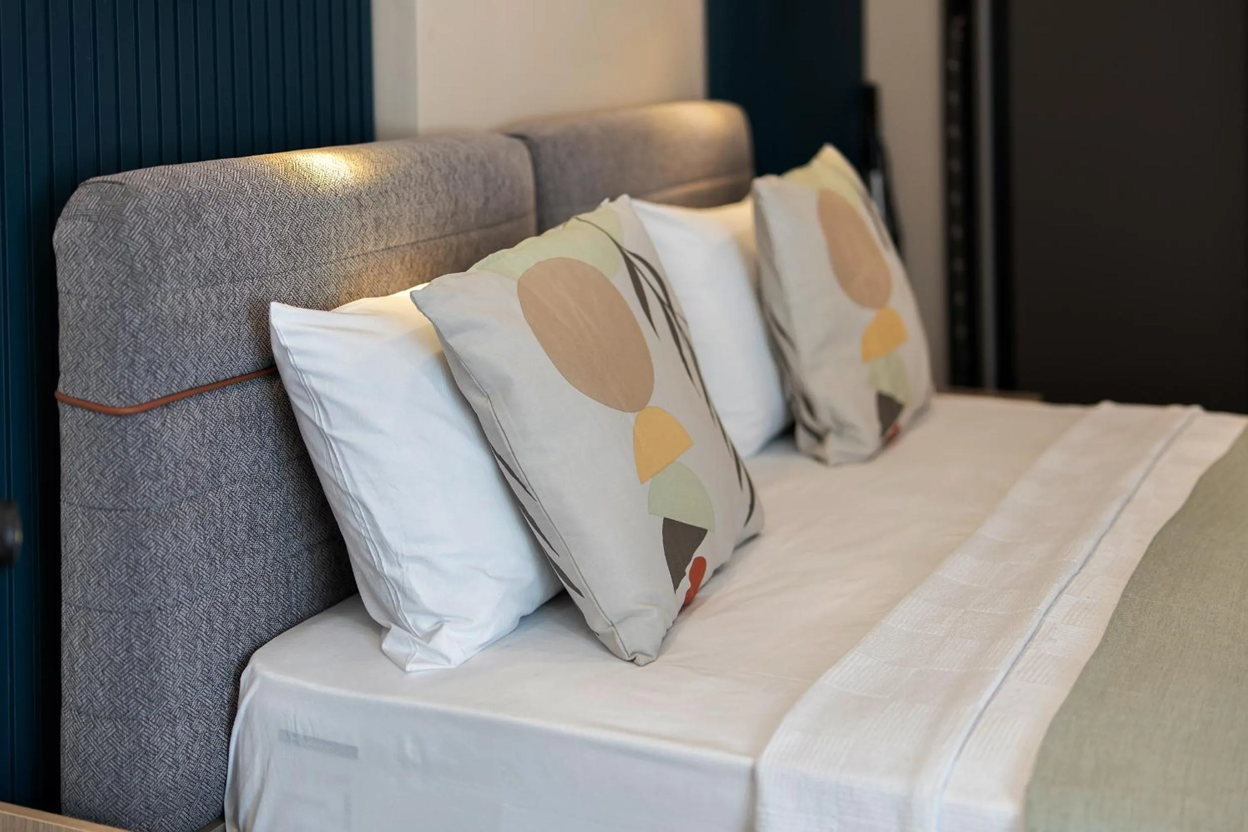 Bed in Doqu Suites Hotel