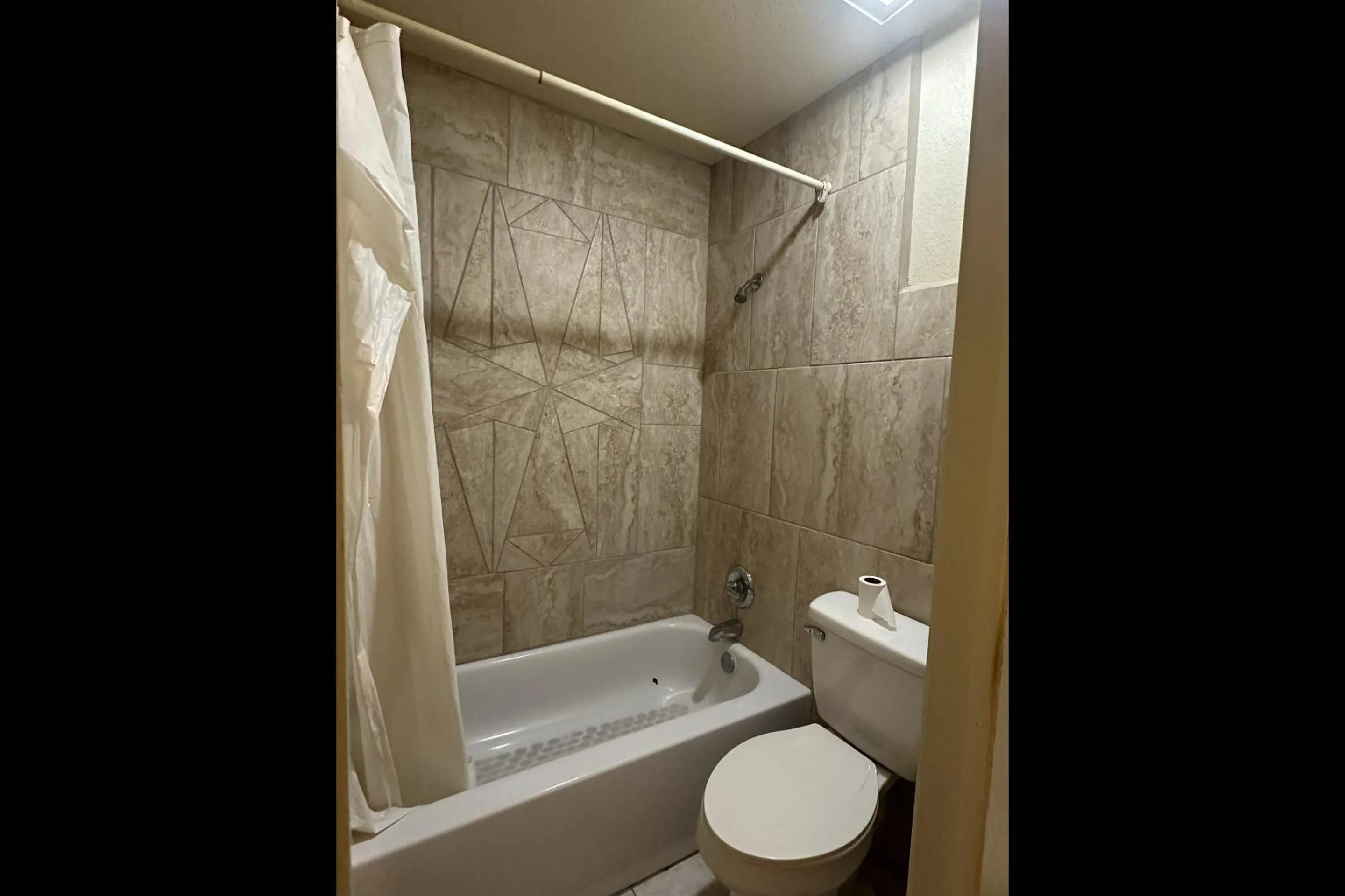 Bathroom in Travel Inn By OYO La Marque Texas City I-45