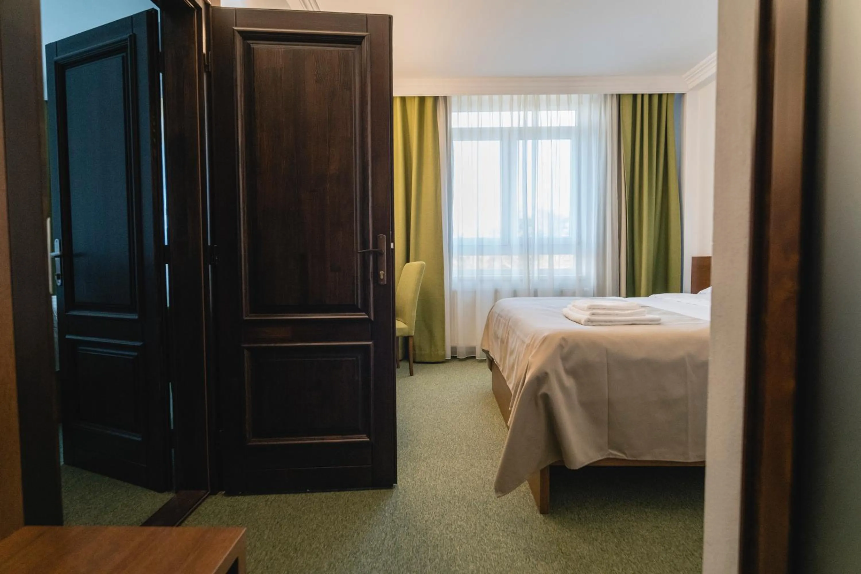 Bed in Hotel Comat Deva