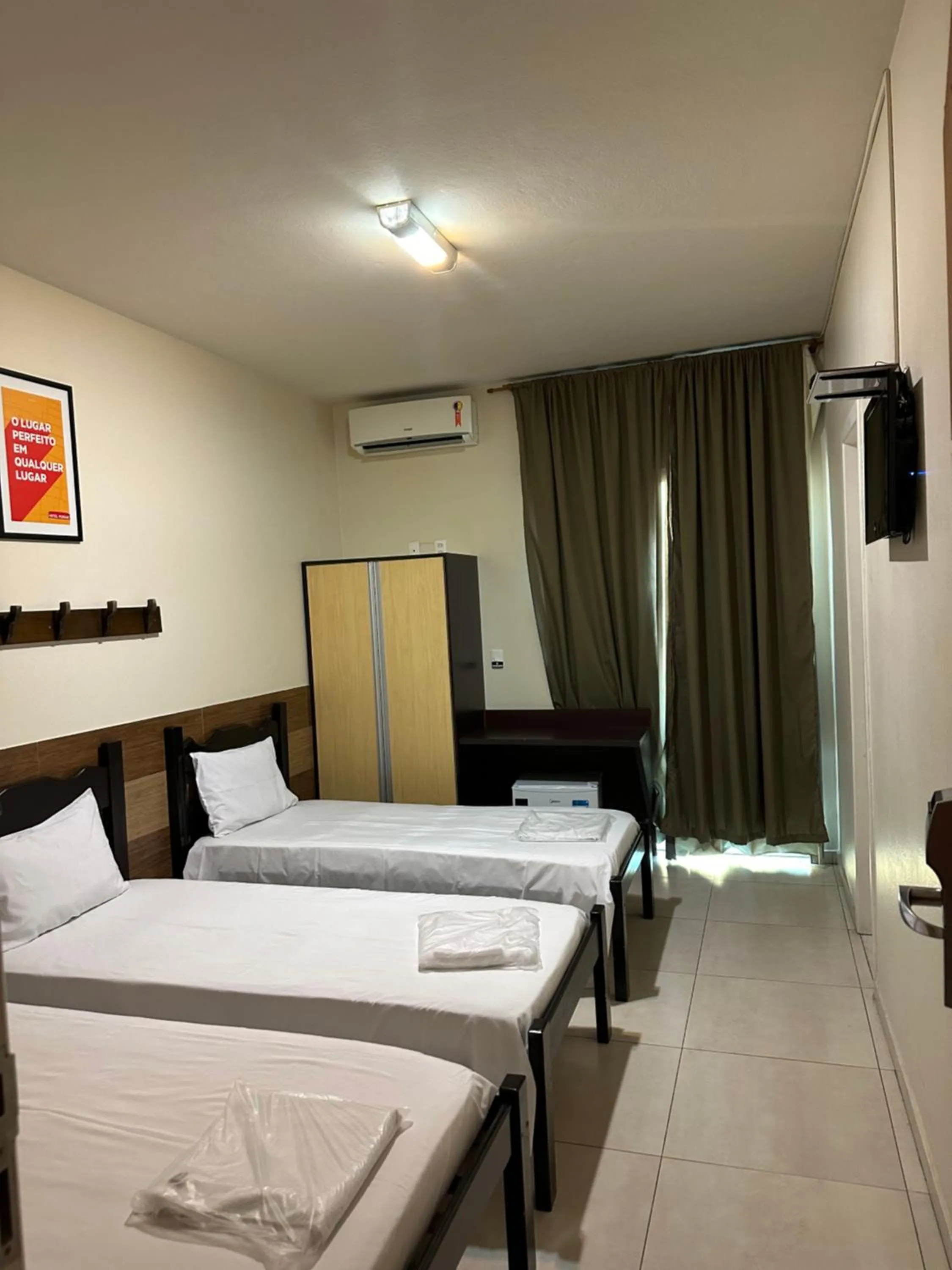 Bed in Hotel Muriaé
