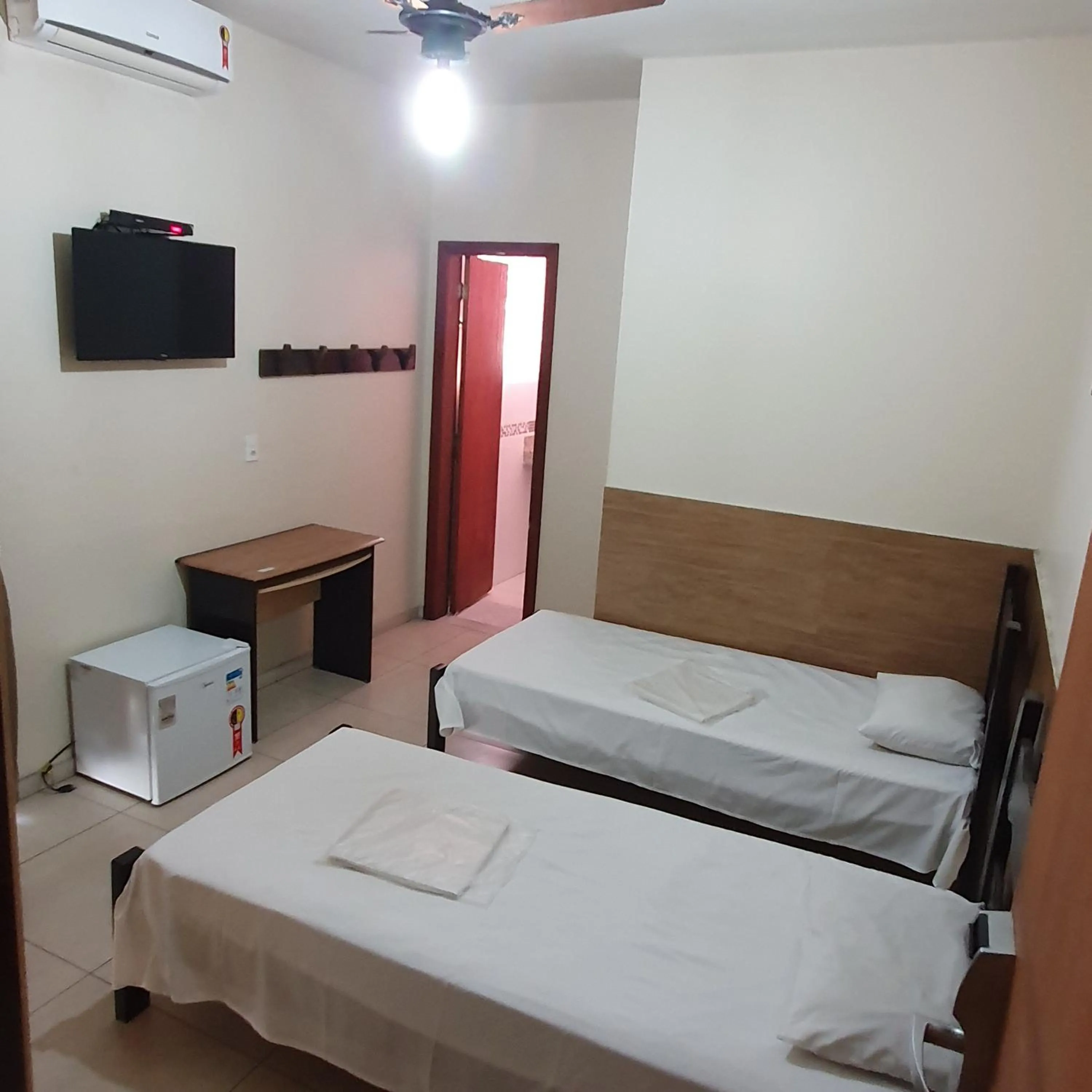 Bed in Hotel Muriaé