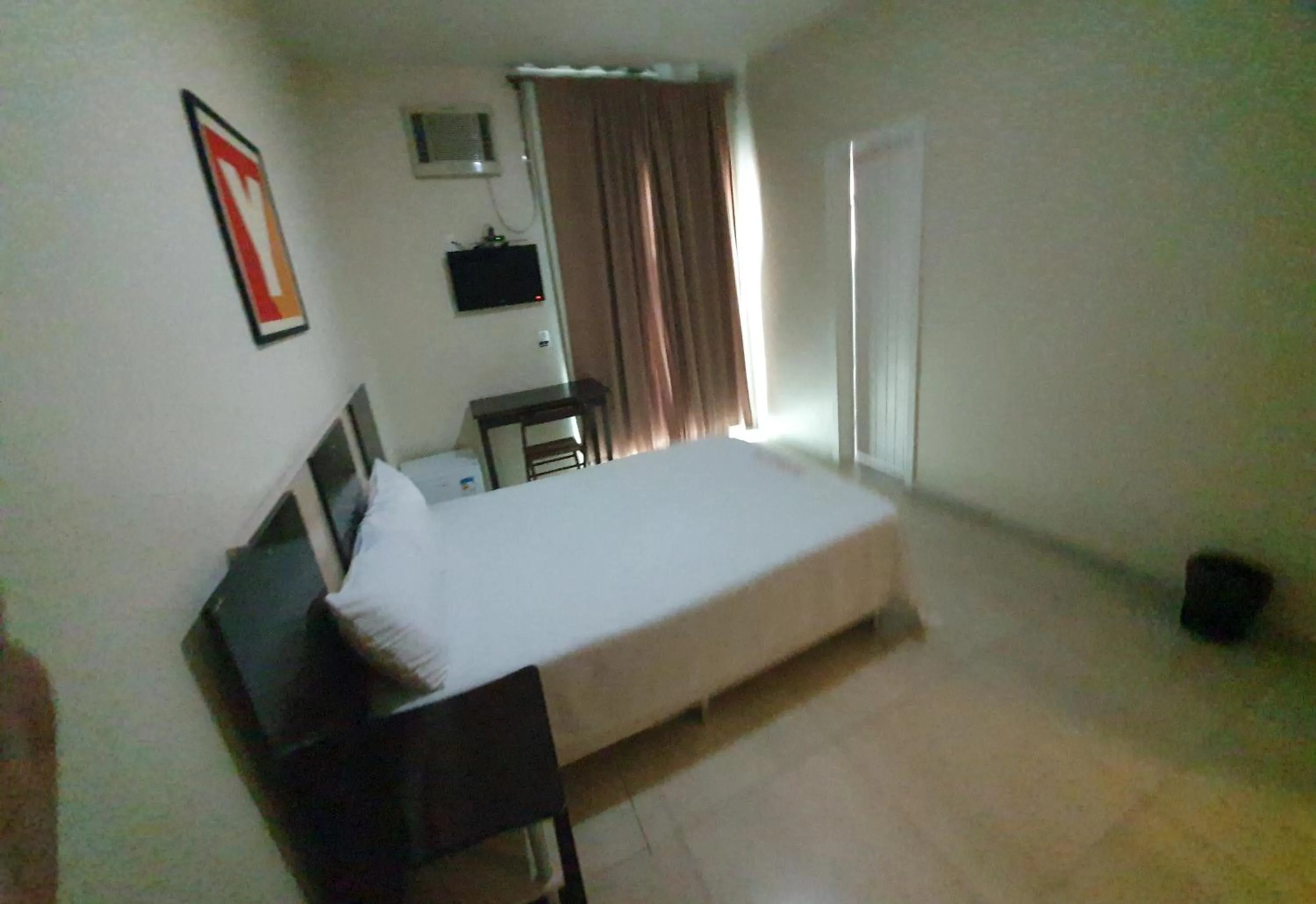 Bed in Hotel Muriaé