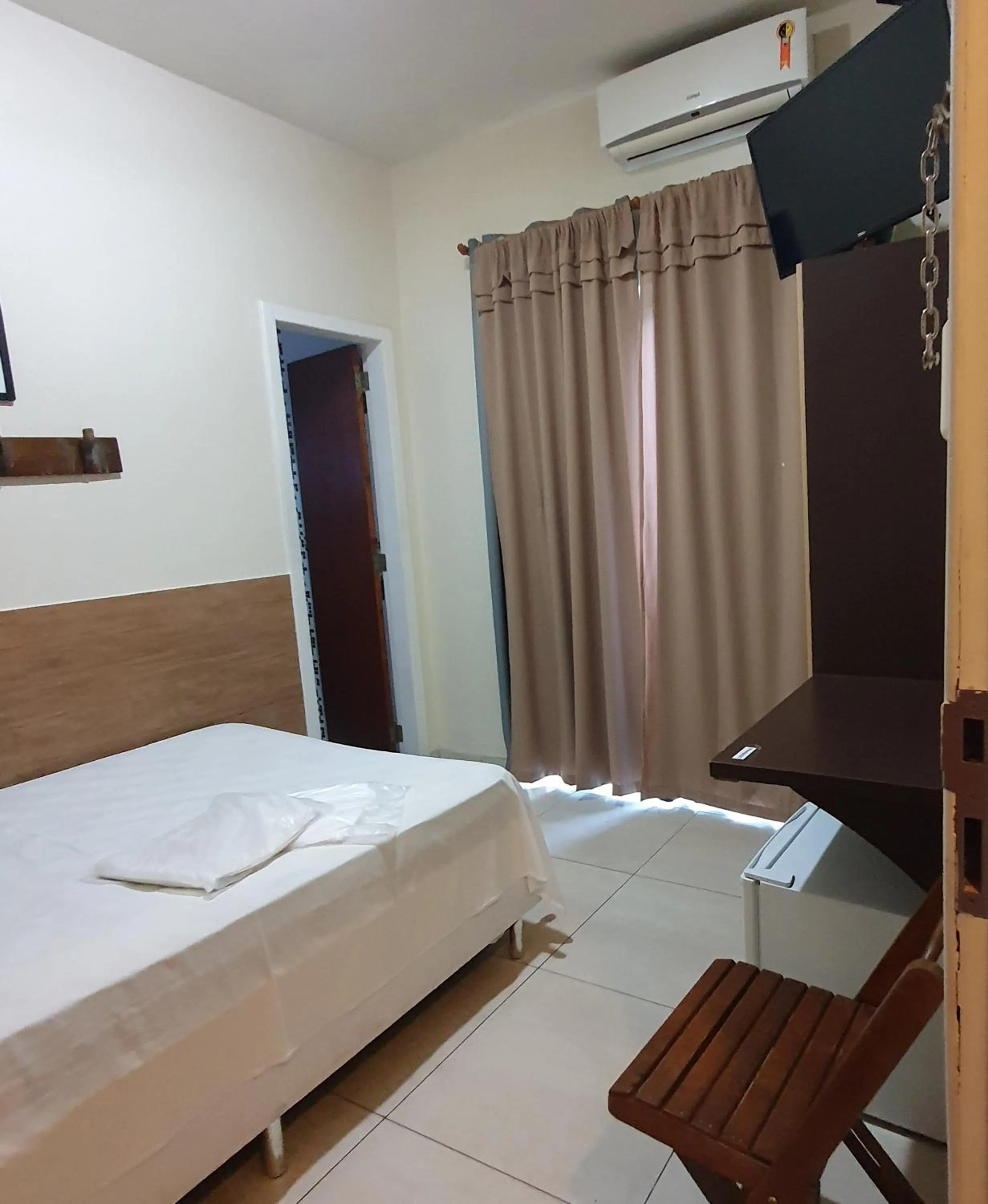 Bed in Hotel Muriaé
