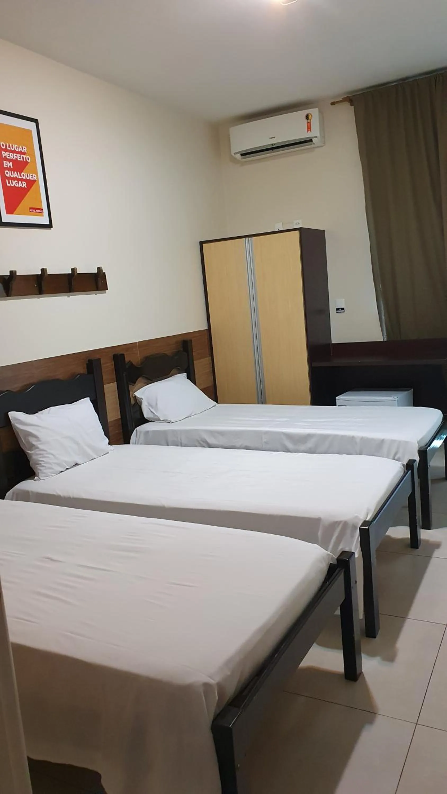 Bed in Hotel Muriaé