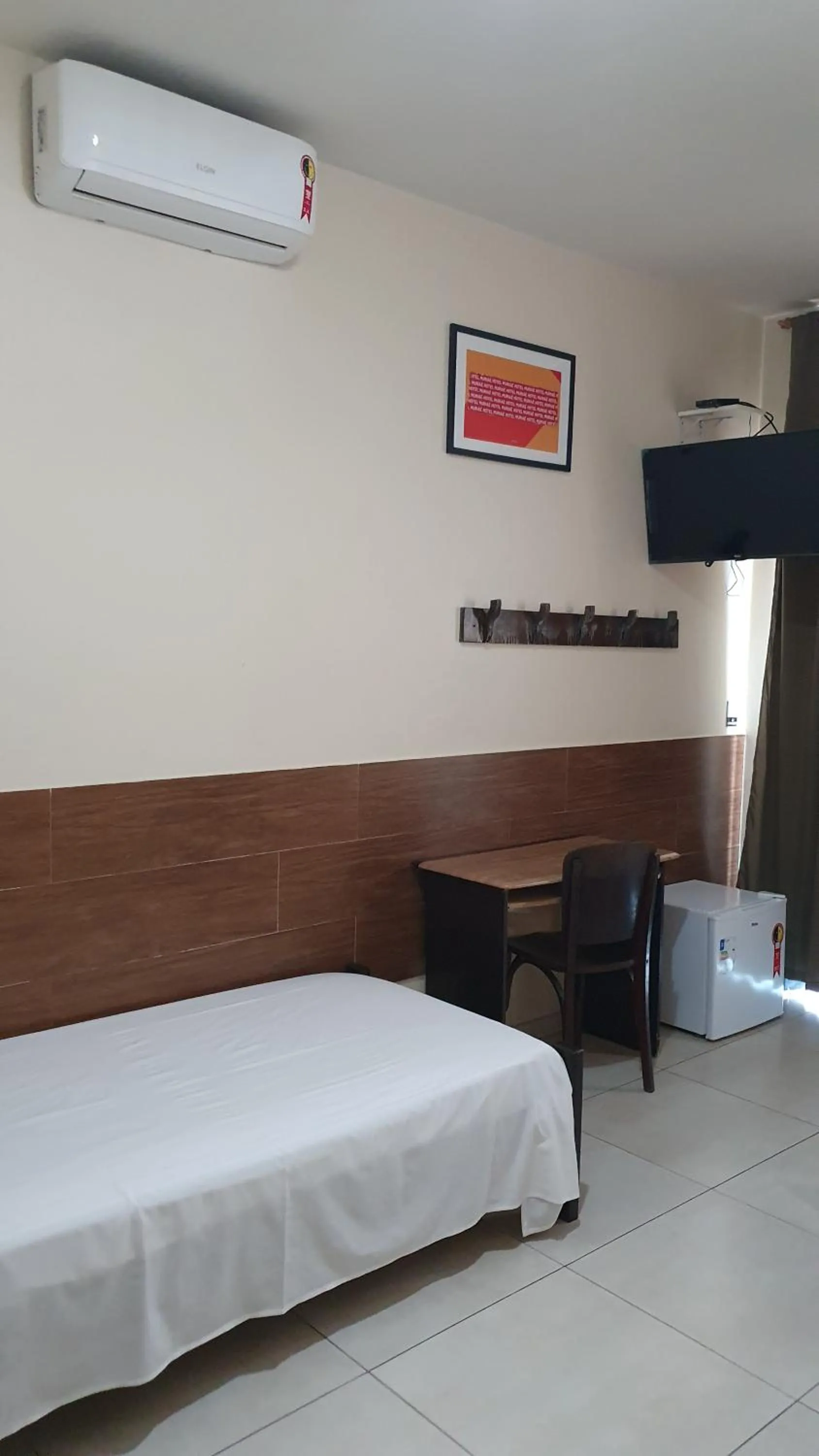 Bed in Hotel Muriaé