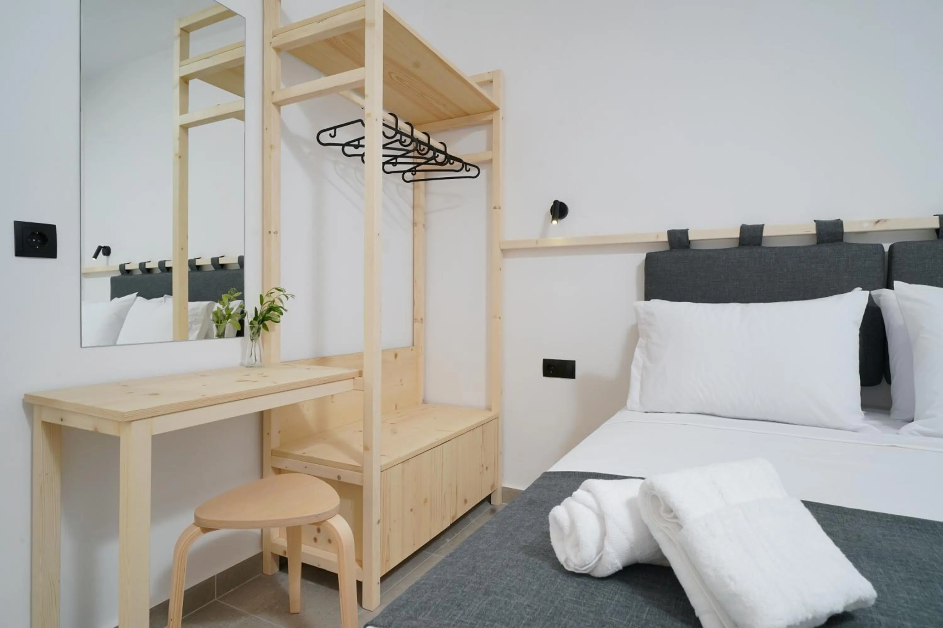 Bed in Emerial Deluxe Seaside Rooms