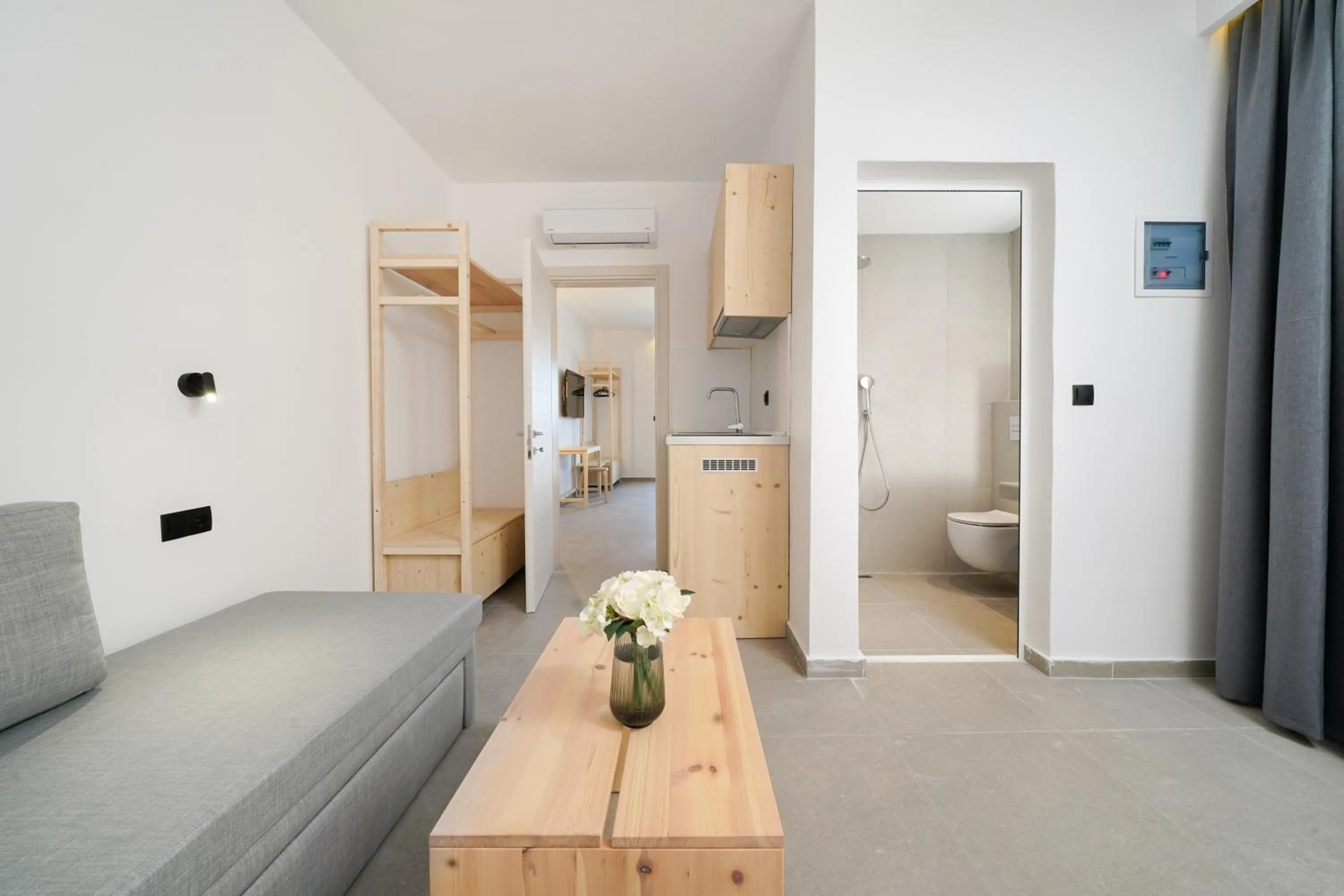 Kitchen or kitchenette, Bed in Emerial Deluxe Seaside Rooms