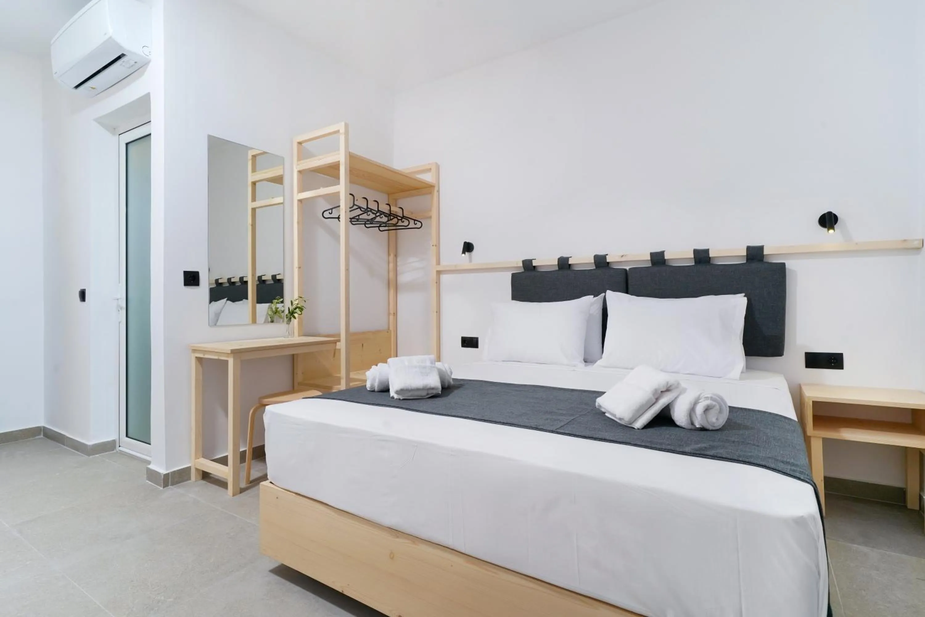 Bed in Emerial Deluxe Seaside Rooms