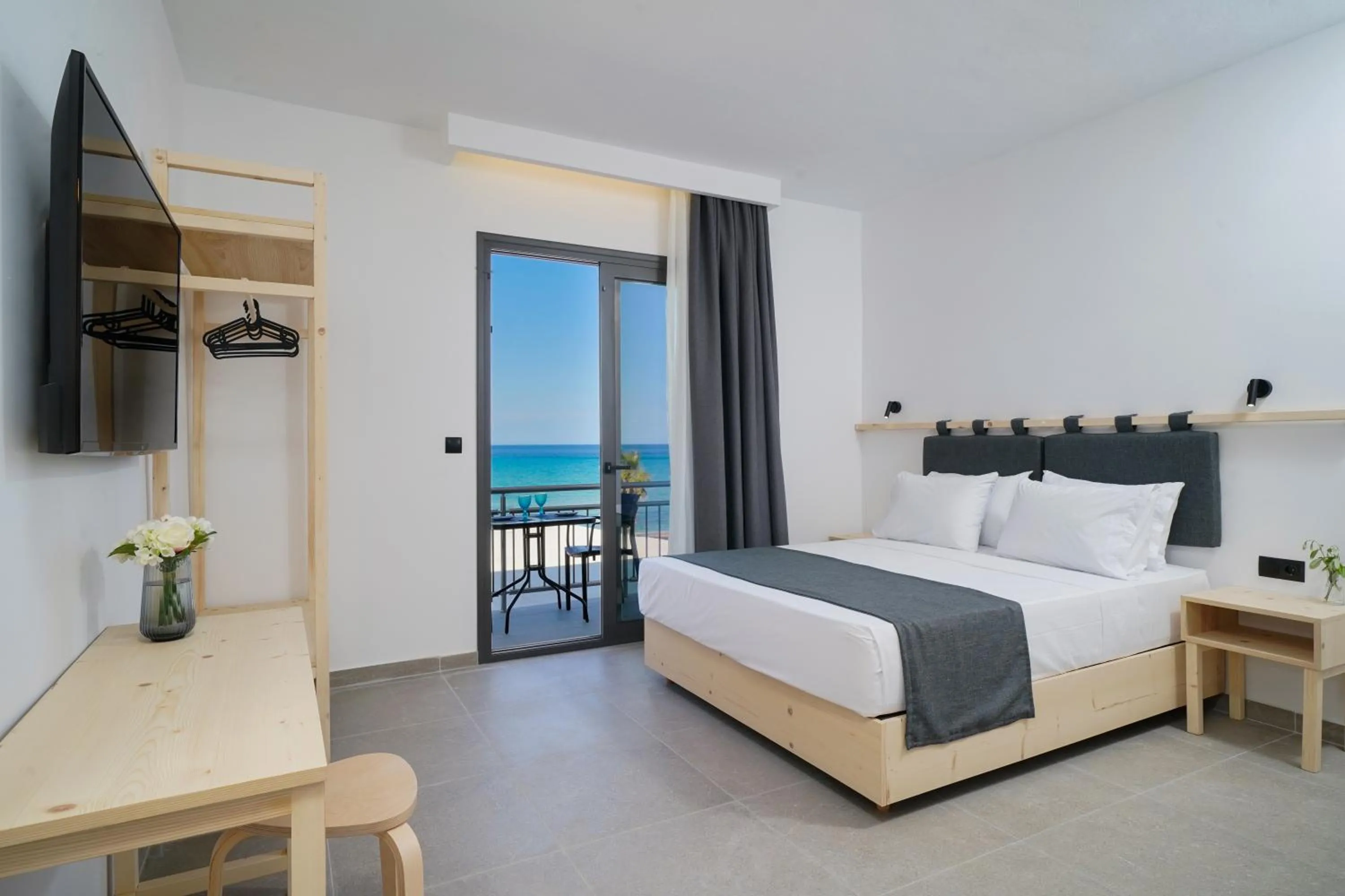Bed in Emerial Deluxe Seaside Rooms