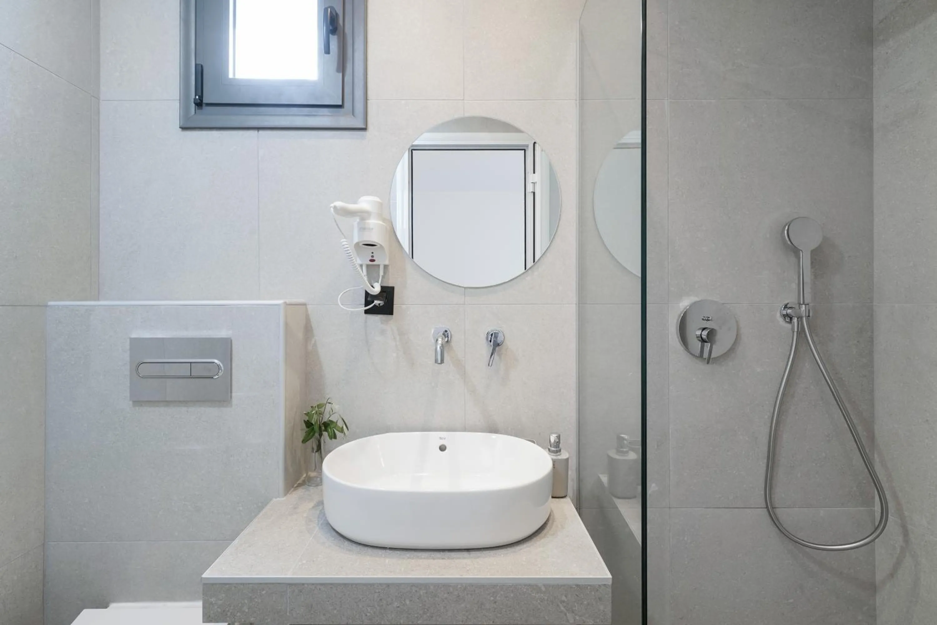 Shower in Emerial Deluxe Seaside Rooms
