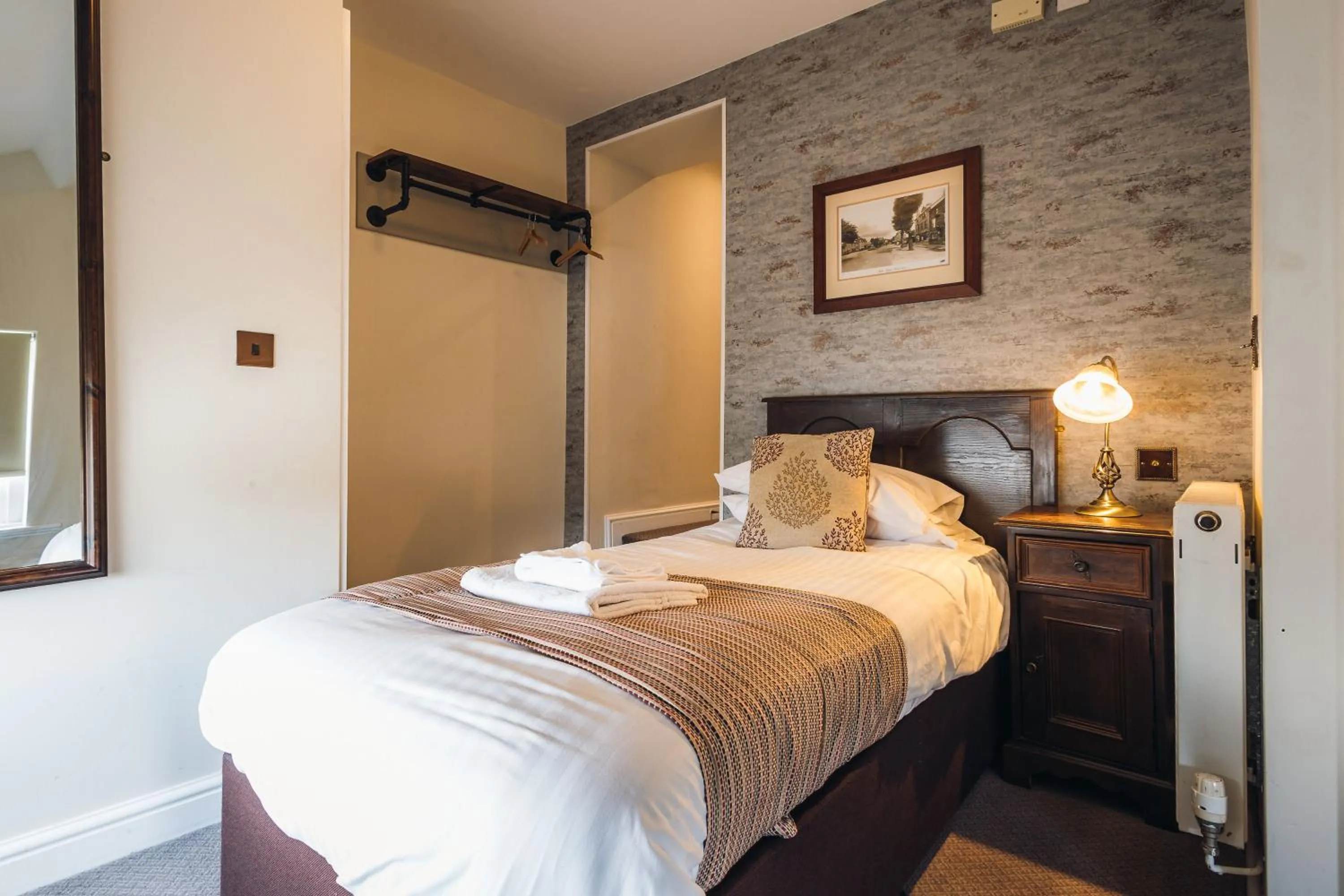 Bed in White Lion Royal Hotel