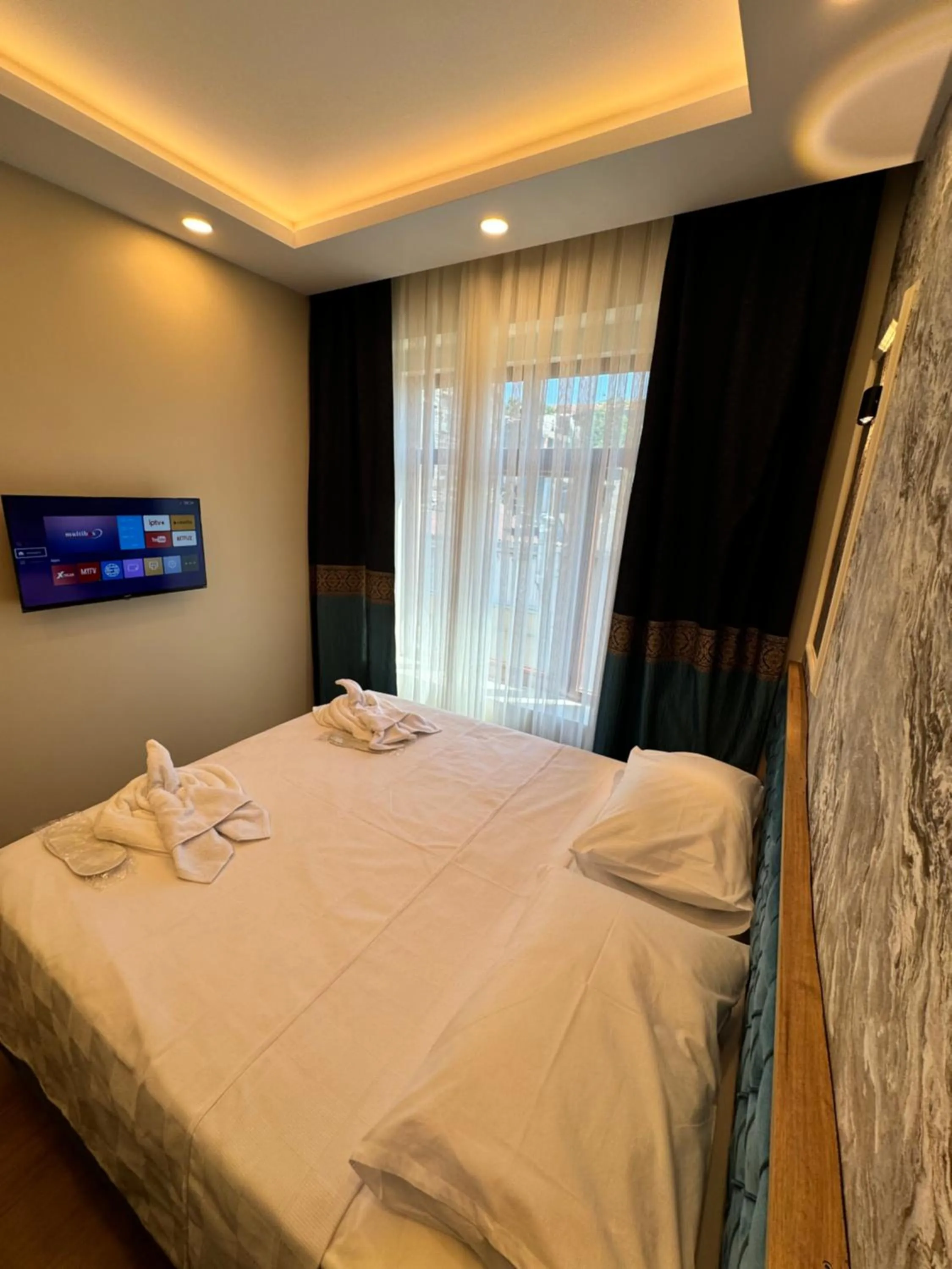 Bed in Riverside Hotel