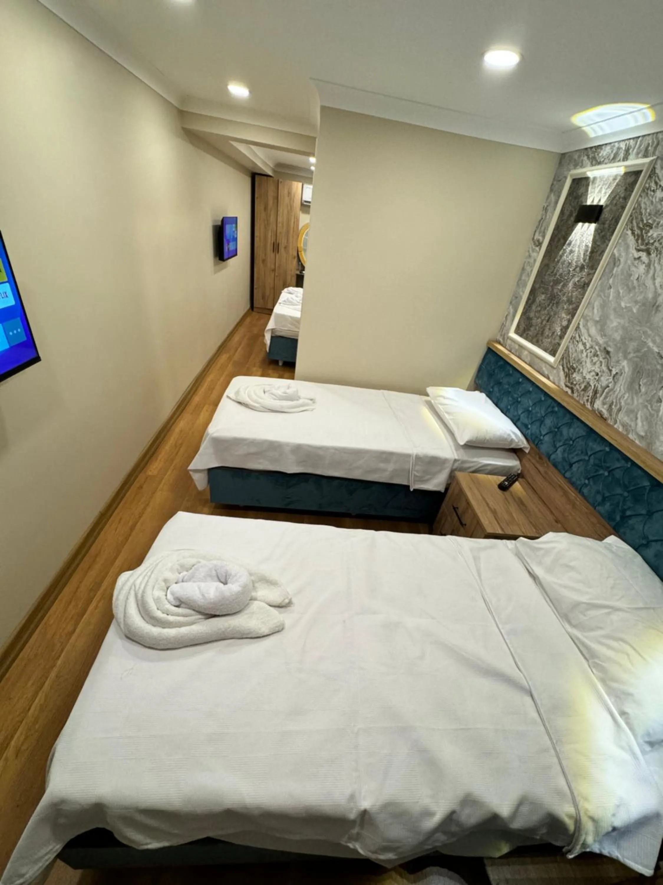 Bed in Riverside Hotel