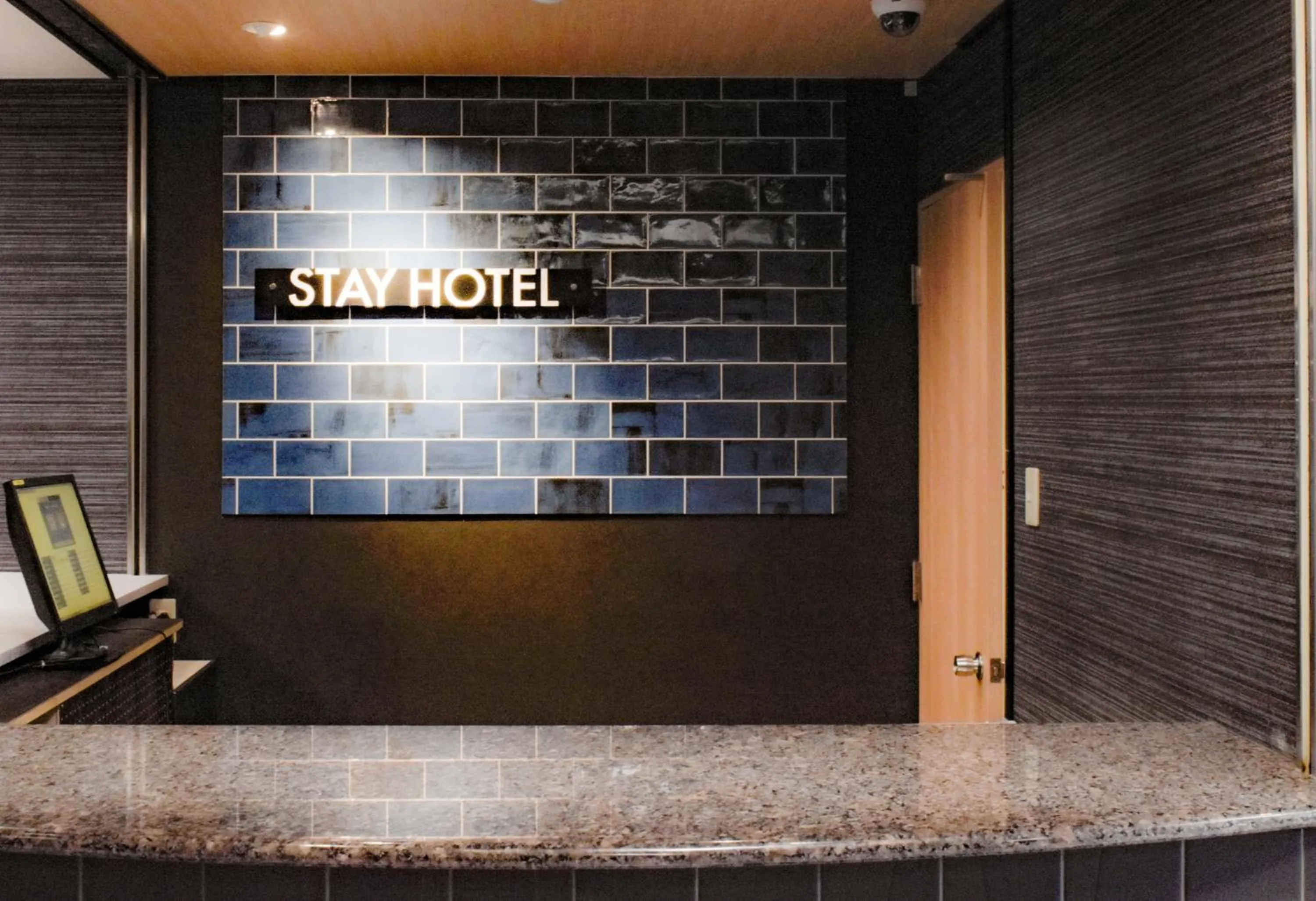 Property logo or sign in Stay HOTEL