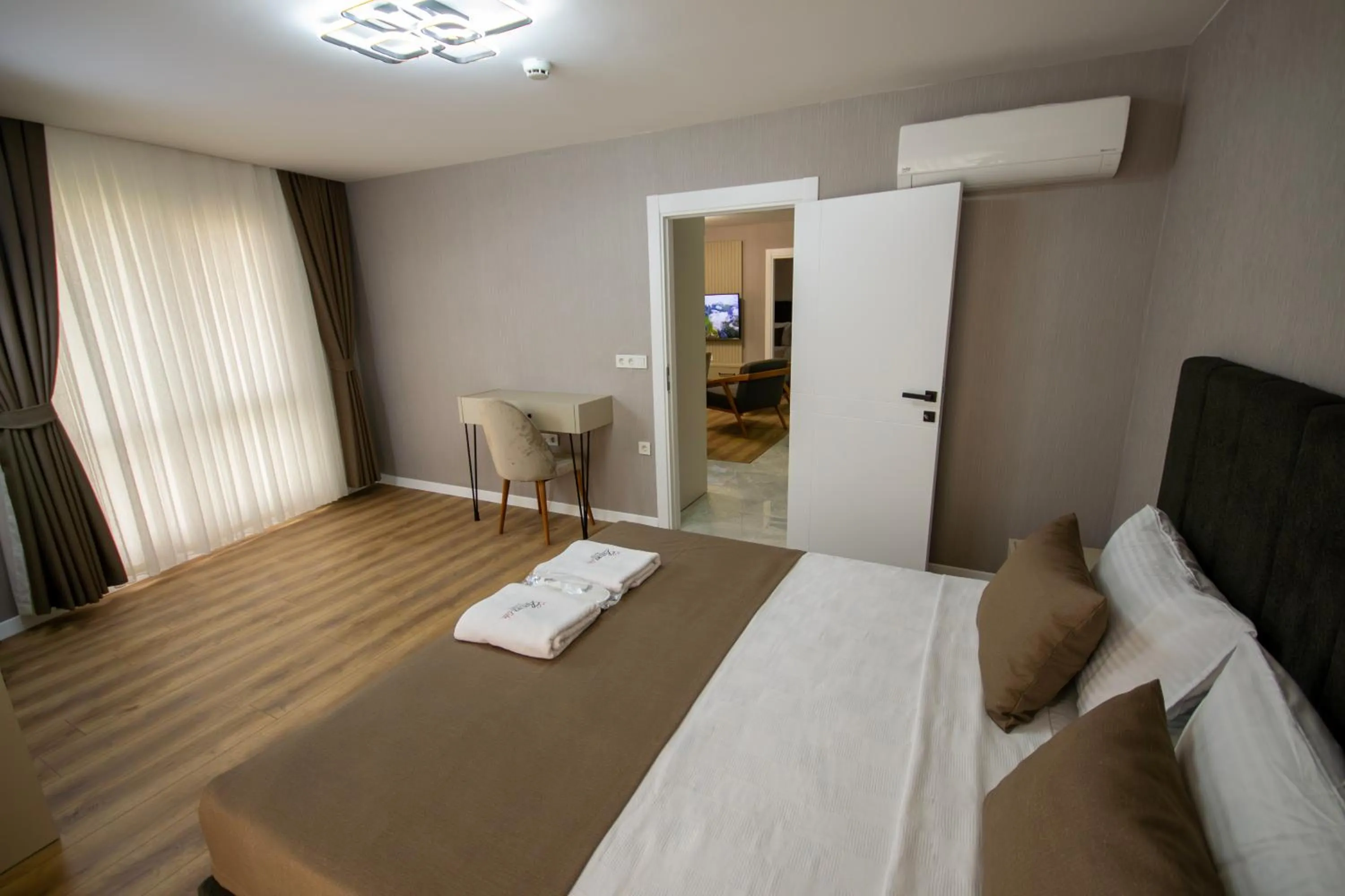 Bed in Luxury Life Suites