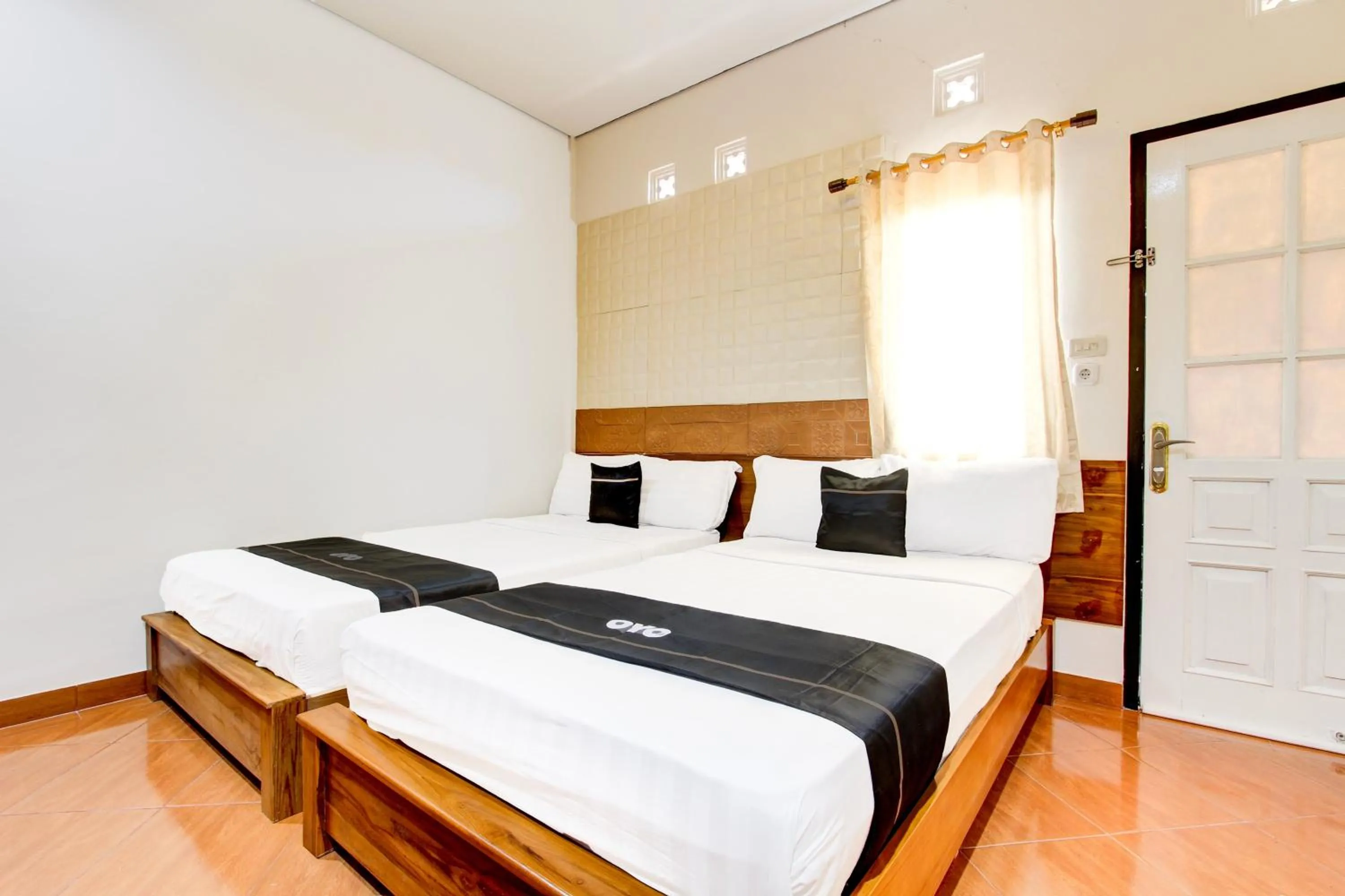 Bedroom in Capital O 93994 Dalem Kamulyan Syariah Guest House