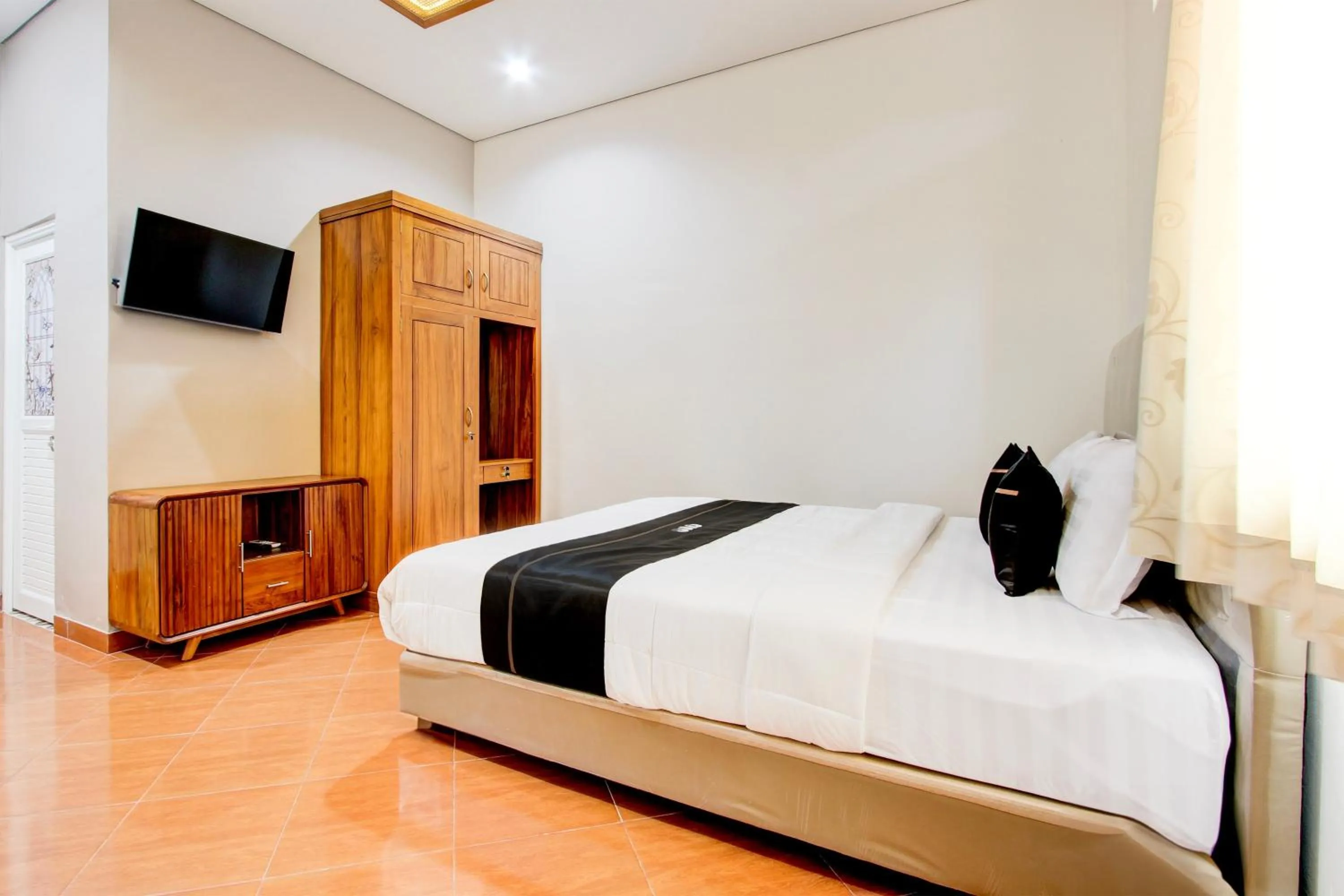 Bedroom in Capital O 93994 Dalem Kamulyan Syariah Guest House