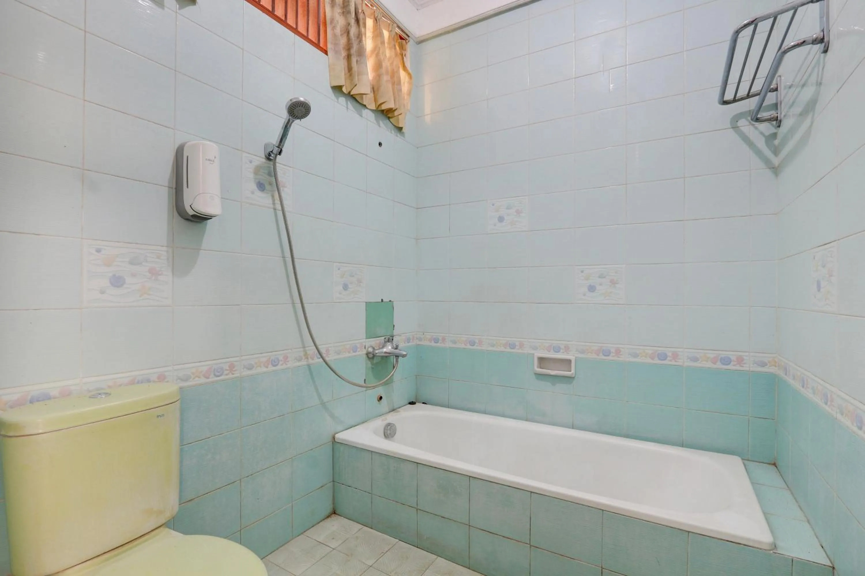 Bathroom in Hotel O Omah Citra Genia Homestay