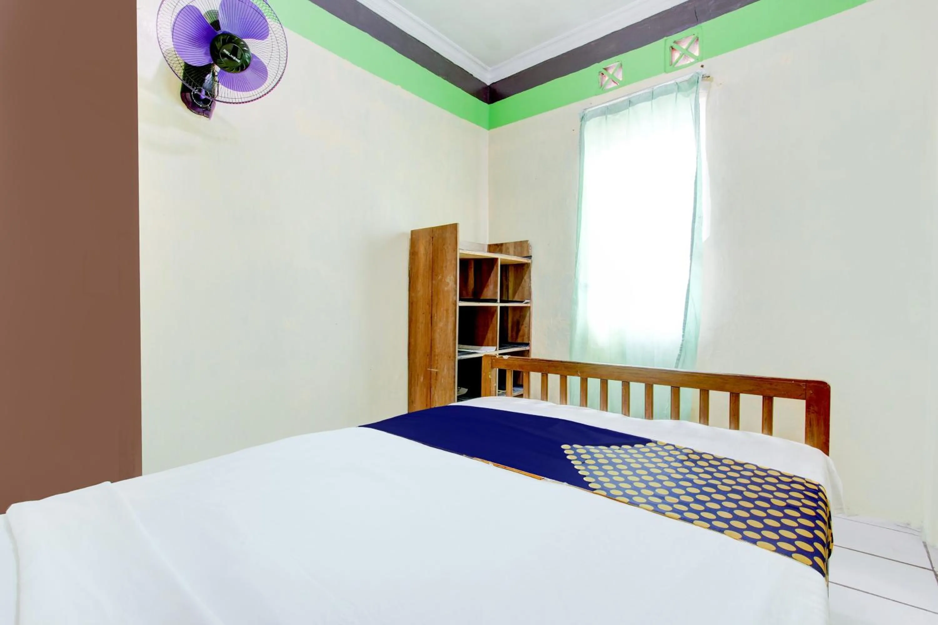 Bedroom in Hotel O Homestay Bintang Syariah