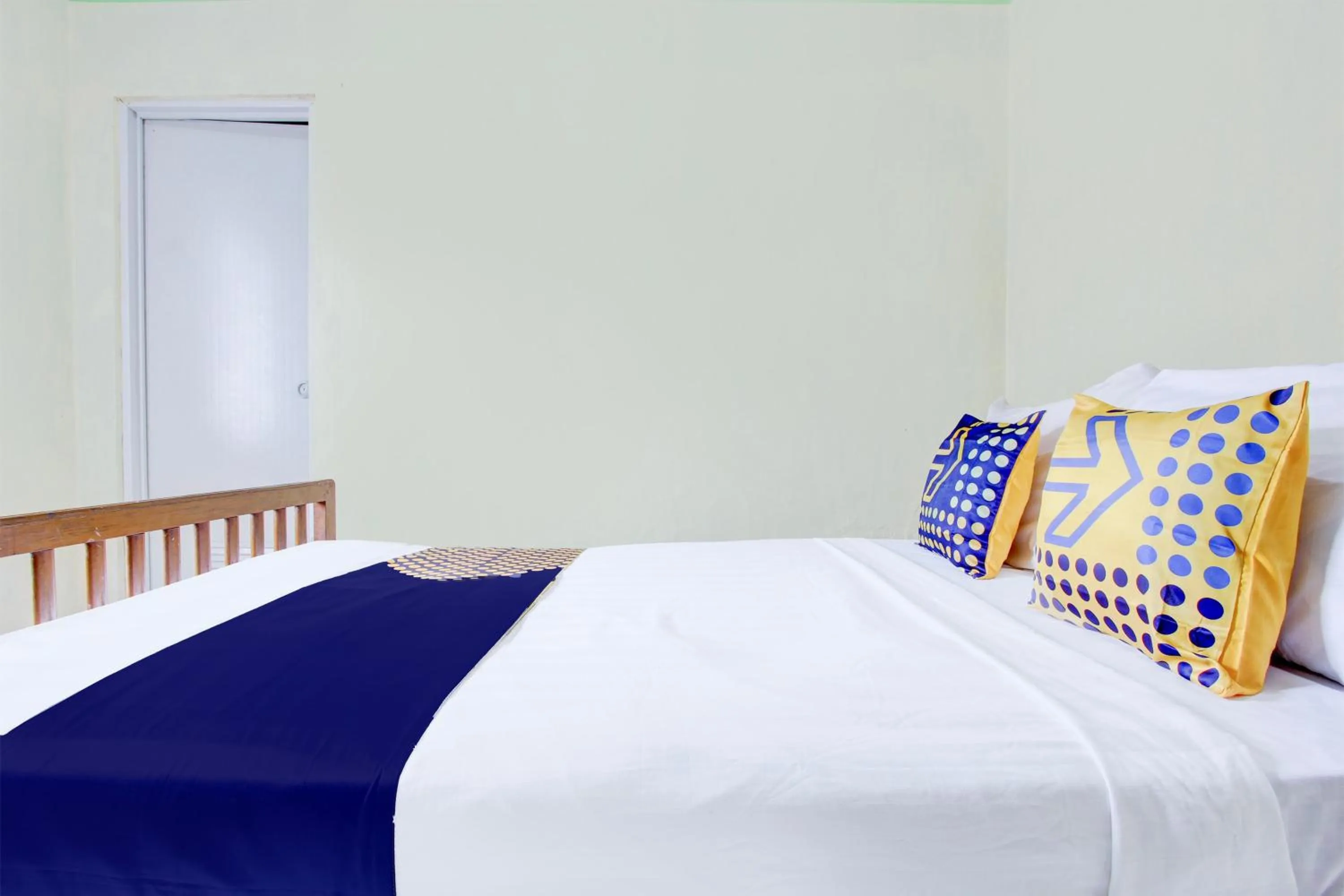 Bedroom in Hotel O Homestay Bintang Syariah