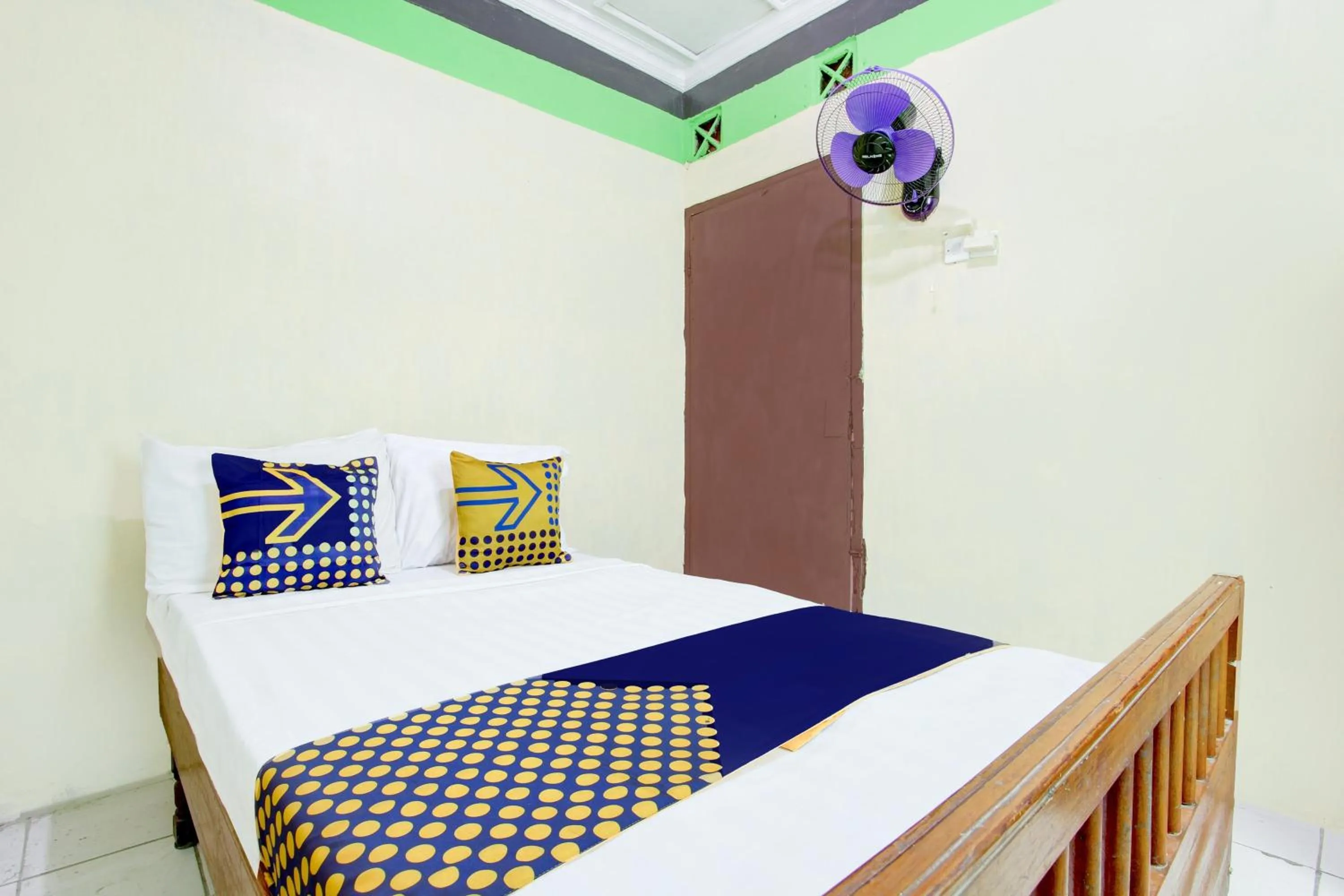 Bedroom in Hotel O Homestay Bintang Syariah