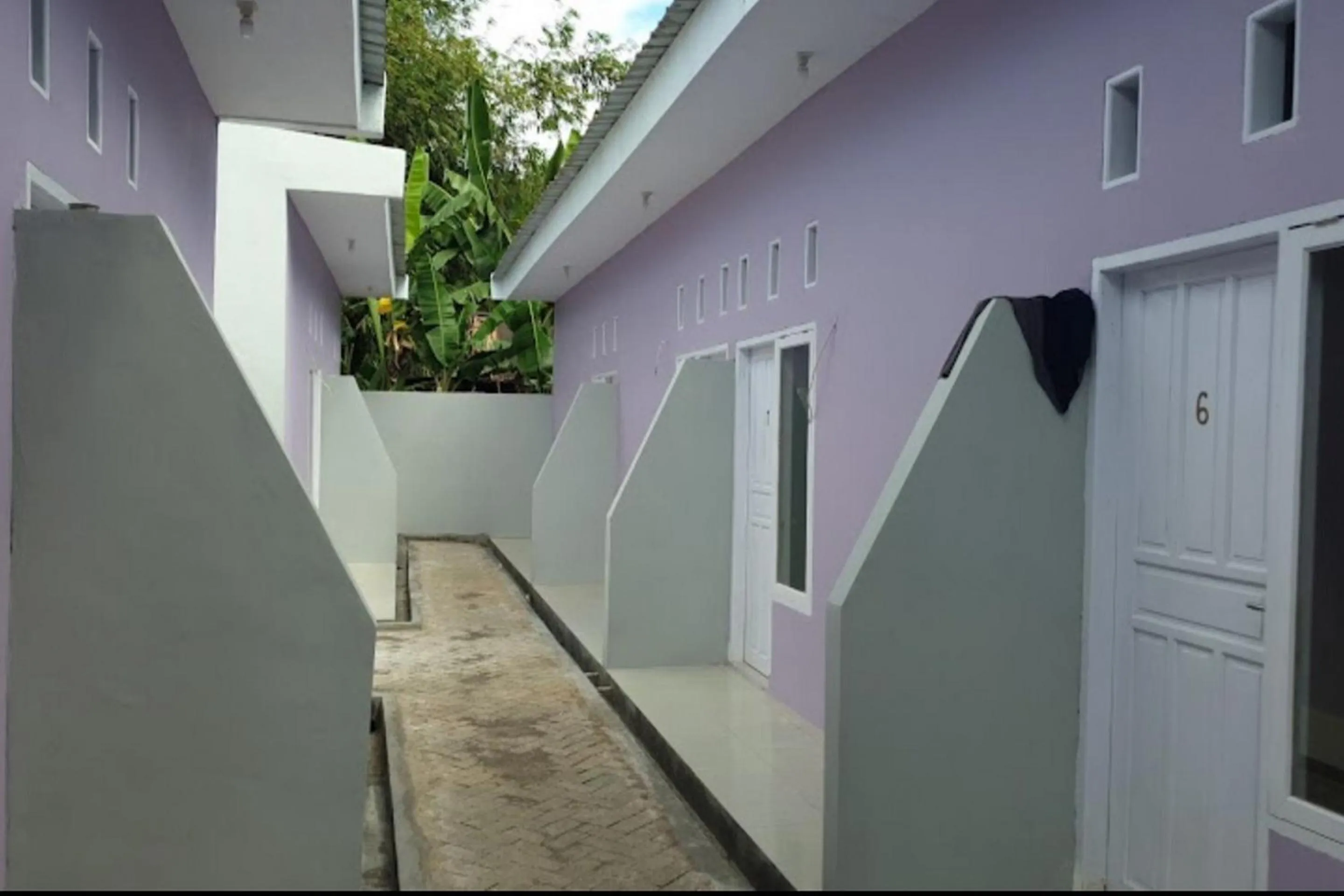 Facade/entrance in OYO 94015 Kost Alif Near Masjid Jami Nurul Huda