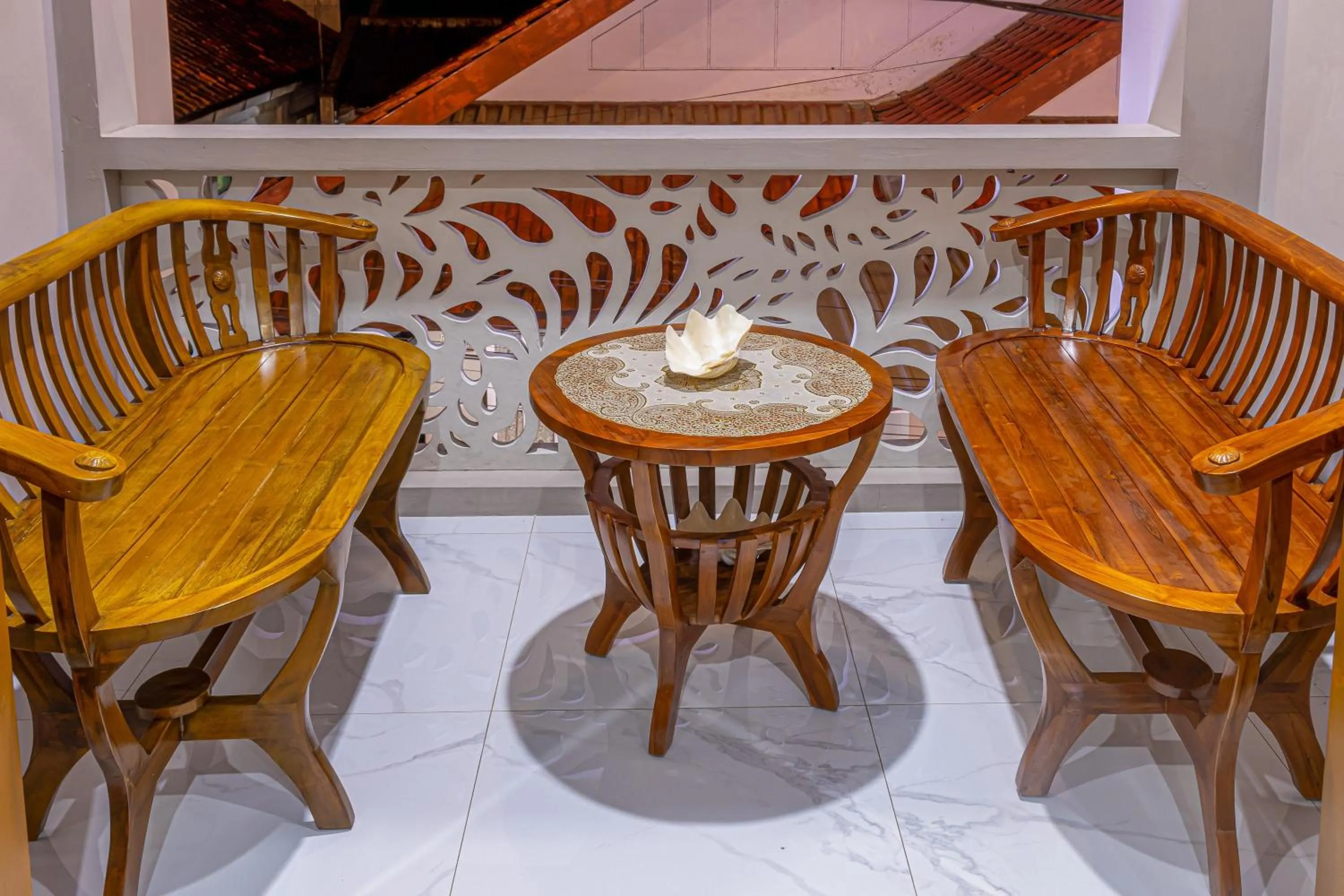 Seating area in RedDoorz at Uma Arda Hometown