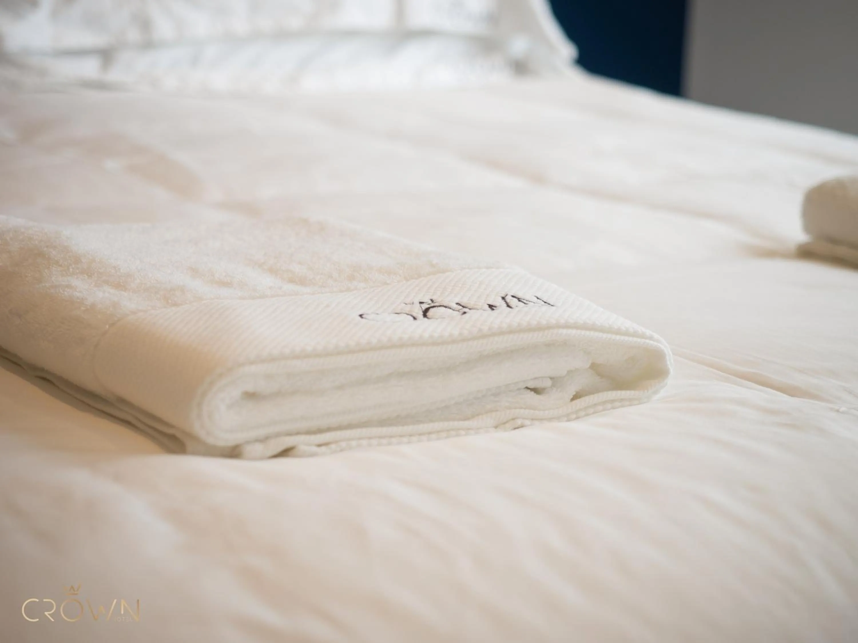 towels, Bed in Crown Hotel