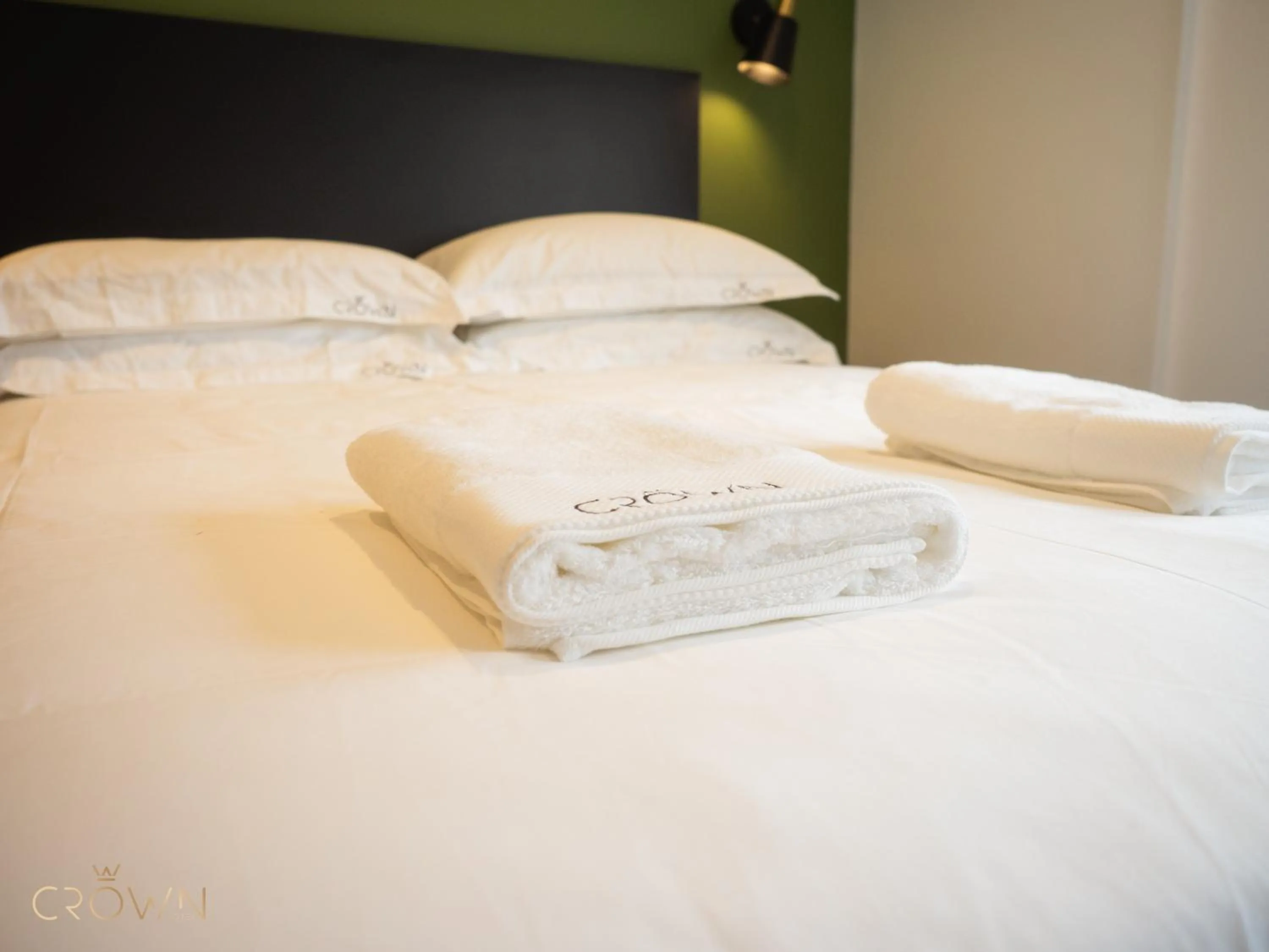 towels, Bed in Crown Hotel