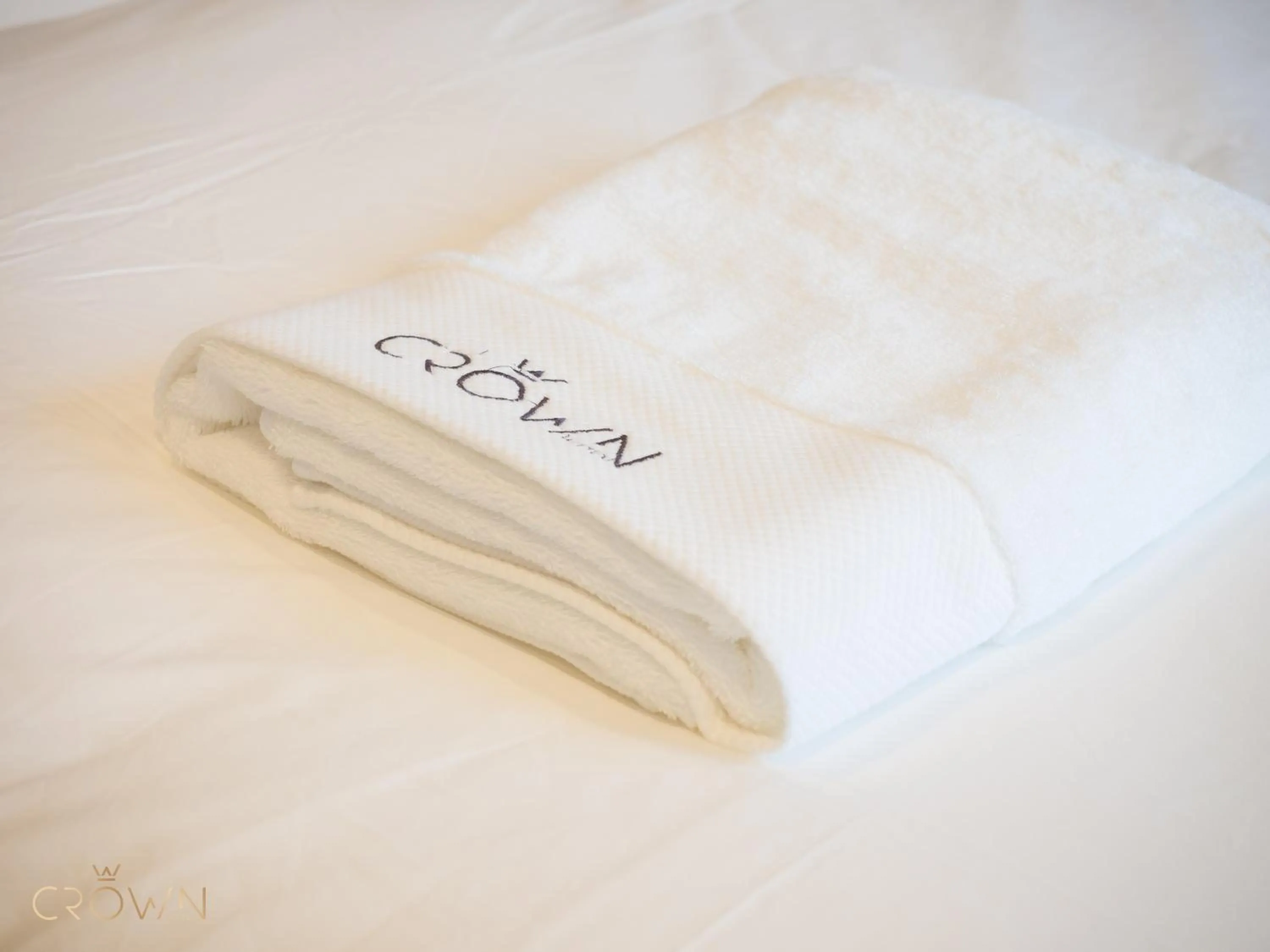 towels, Bed in Crown Hotel