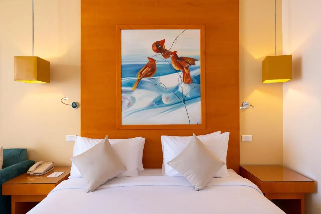 Bed in Parrotel Beach Resorts